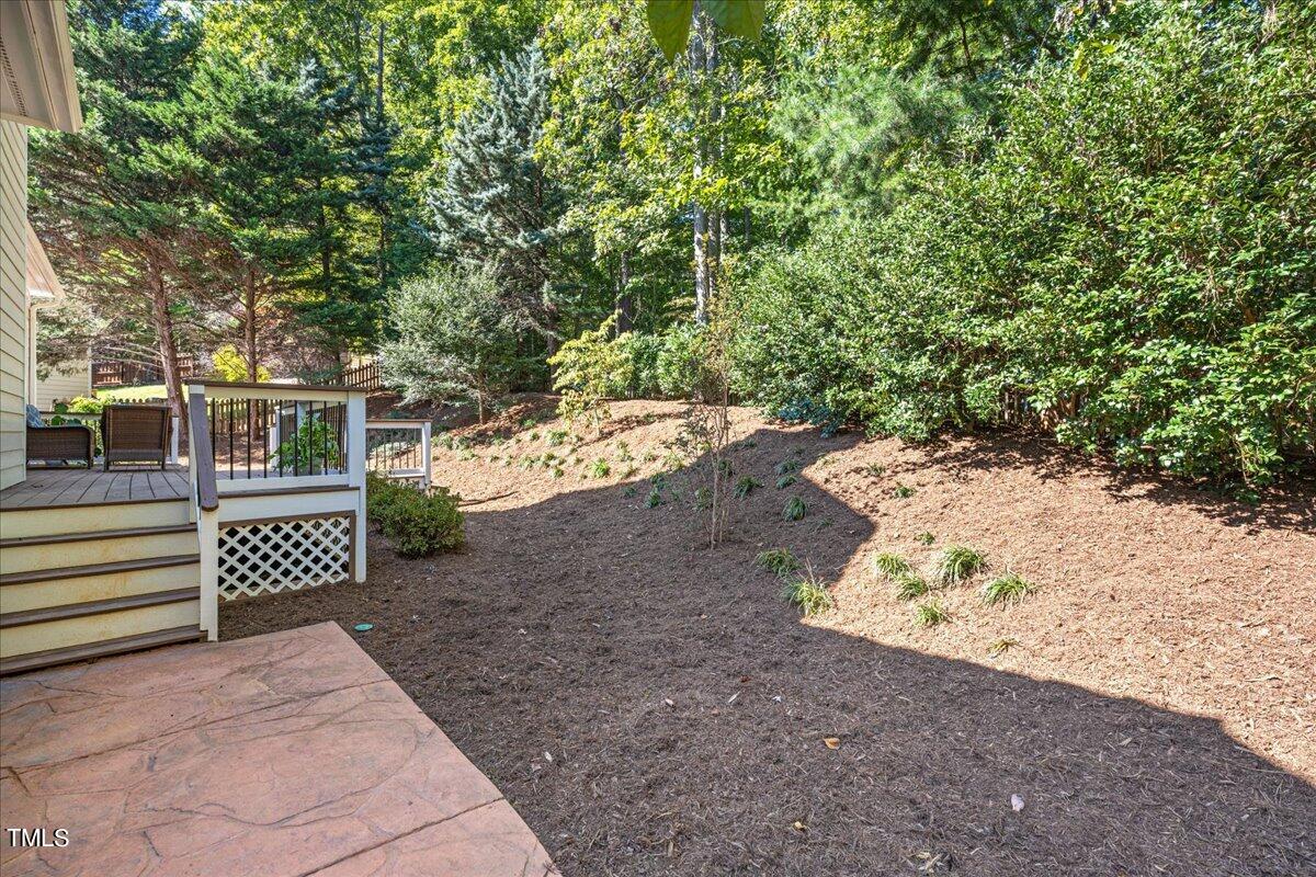 714 Continental Drive Durham, NC 27712 - Photo 31 of 34 a view of a yard with wooden fence