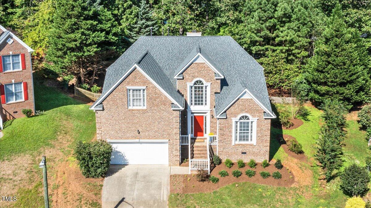 714 Continental Drive Durham, NC 27712 - Photo 5 of 34 a view of house with garden