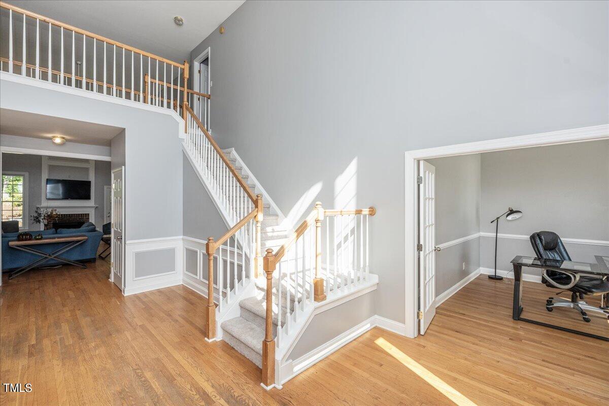 714 Continental Drive Durham, NC 27712 - Photo 6 of 34 a view of entryway livingroom and hall with wooden floor