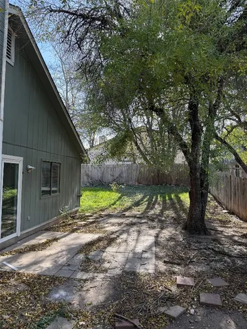 a view of backyard with green space
