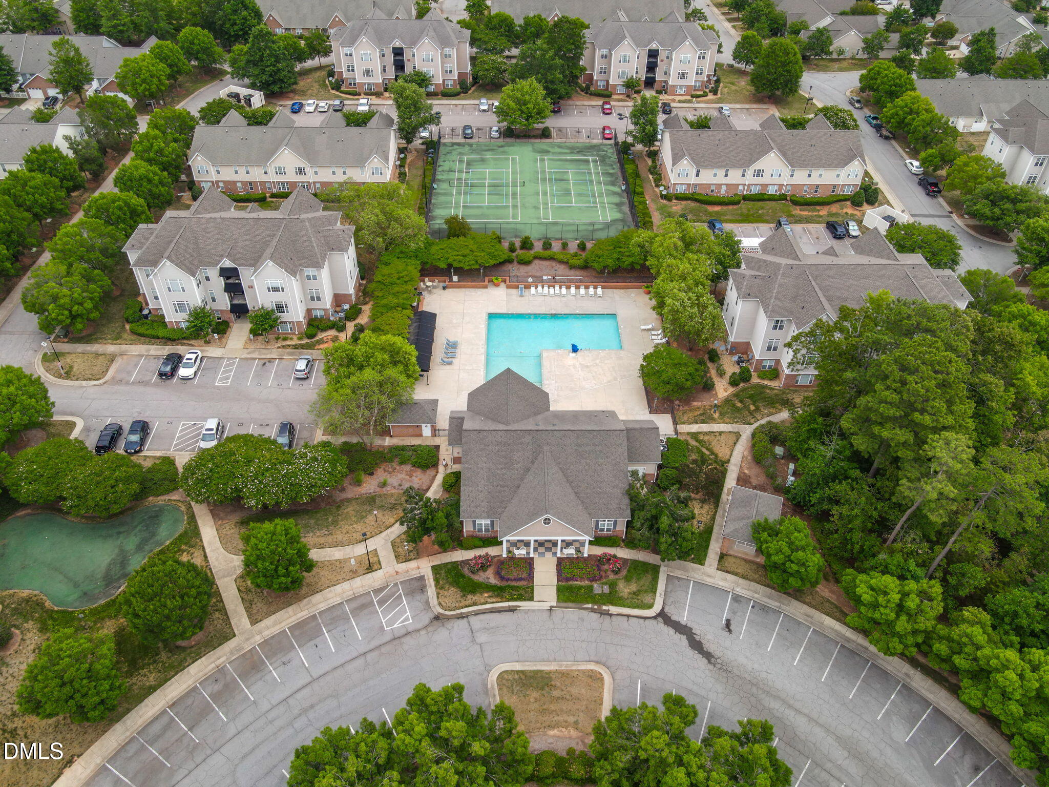 2501 Huntscroft Lane, Unit 100 Raleigh, NC 27617 - Photo 3 of 31 an aerial view of a house with garden space and street view
