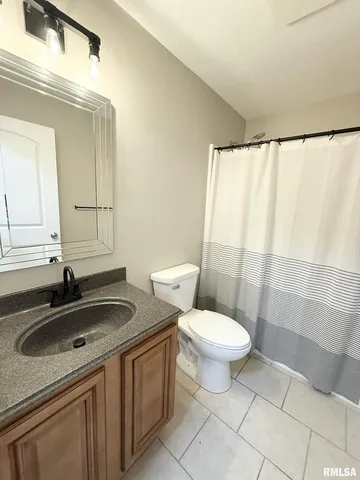 a bathroom with a sink and a toilet