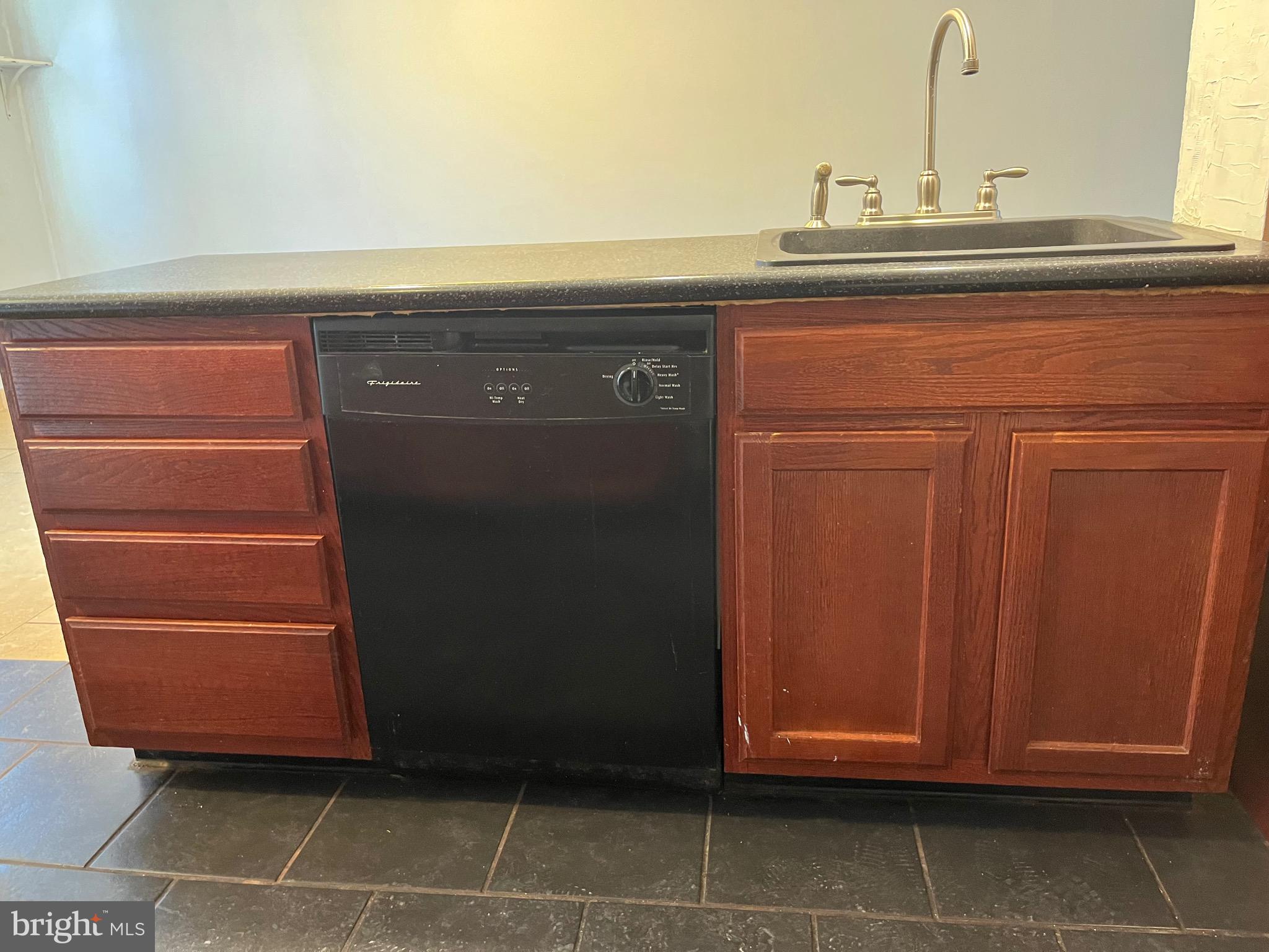 7302 Sherwood Road Philadelphia, PA 19151 - Photo 12 of 51 Island and dishwasher