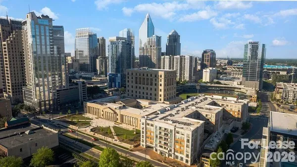 a view of city with tall buildings