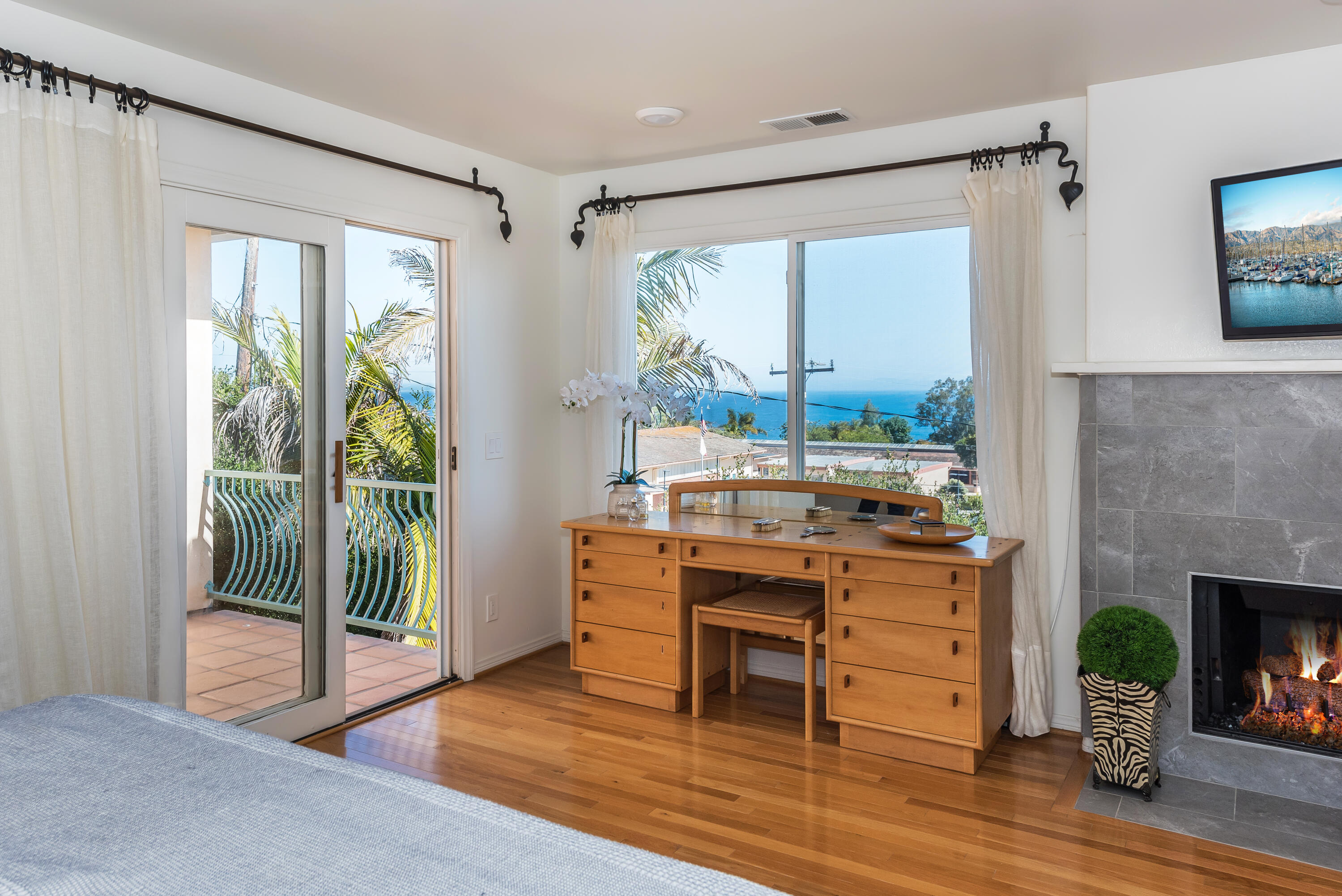 222 Meigs Road, Unit 16 Santa Barbara, CA 93109 - Photo 14 of 26 a room with furniture and a fireplace