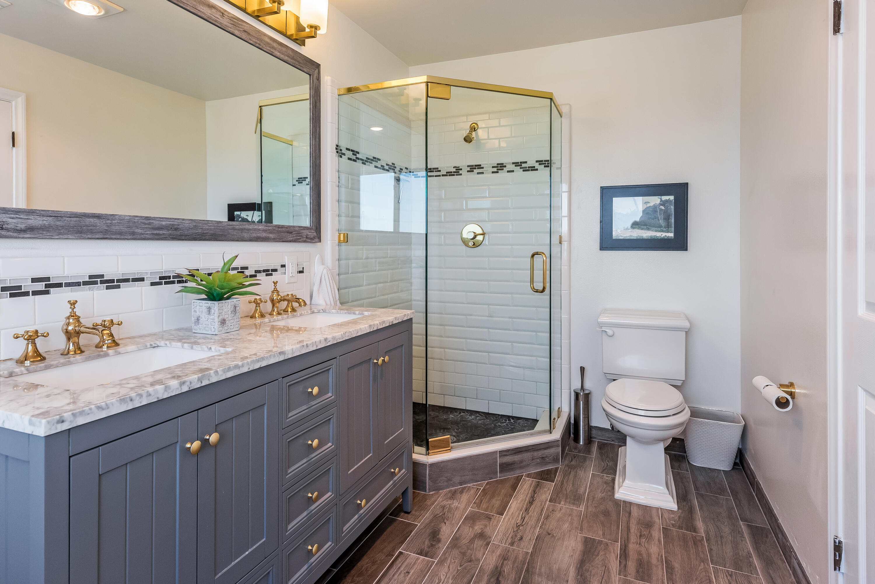 222 Meigs Road, Unit 16 Santa Barbara, CA 93109 - Photo 16 of 26 a spacious bathroom with a granite countertop sink toilet and shower