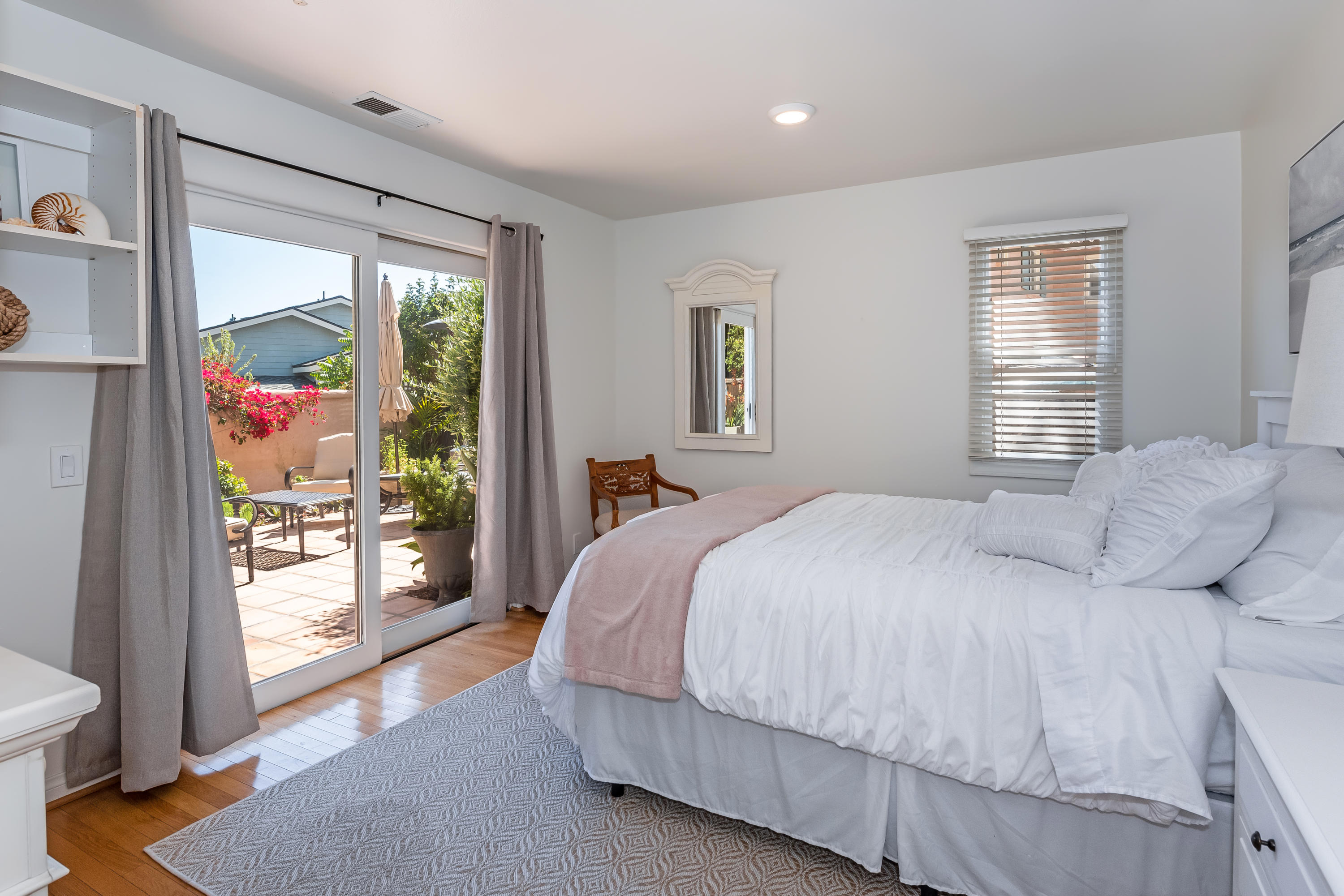 222 Meigs Road, Unit 16 Santa Barbara, CA 93109 - Photo 21 of 26 a bedroom with a large bed and a large window