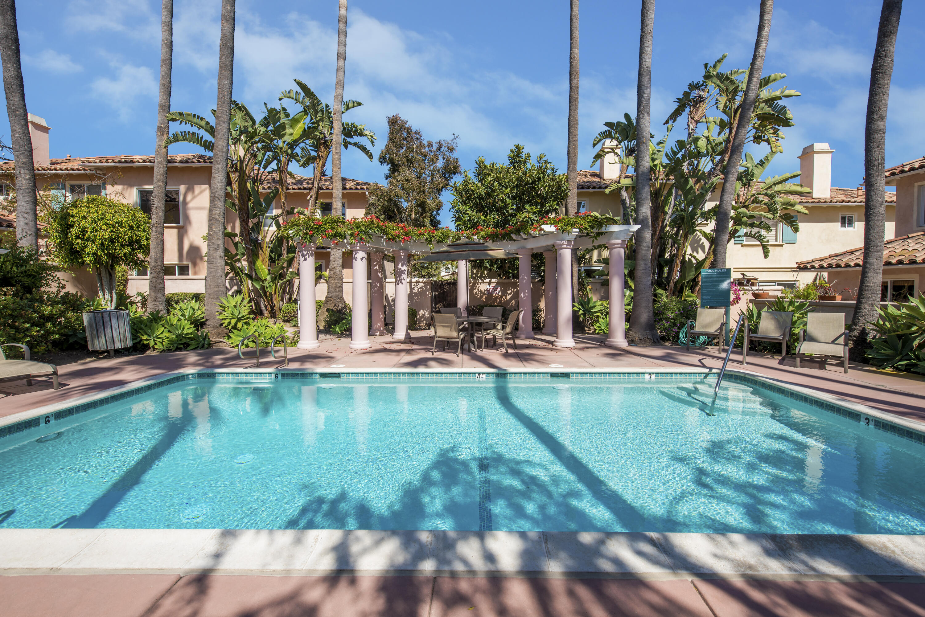 222 Meigs Road, Unit 16 Santa Barbara, CA 93109 - Photo 23 of 26 a swimming pool with outdoor seating and yard