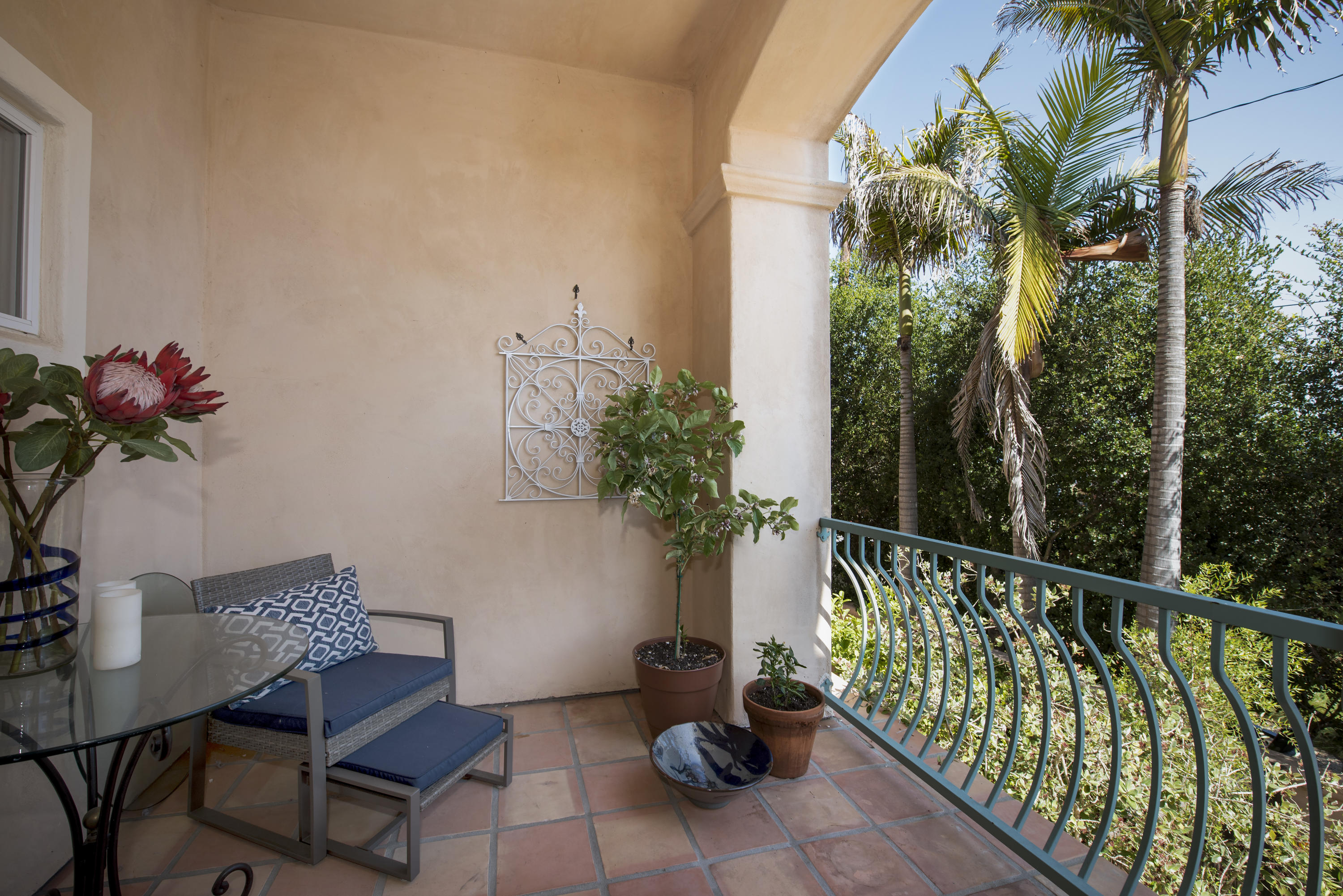 222 Meigs Road, Unit 16 Santa Barbara, CA 93109 - Photo 7 of 26 a view of a balcony with chair and potted plant