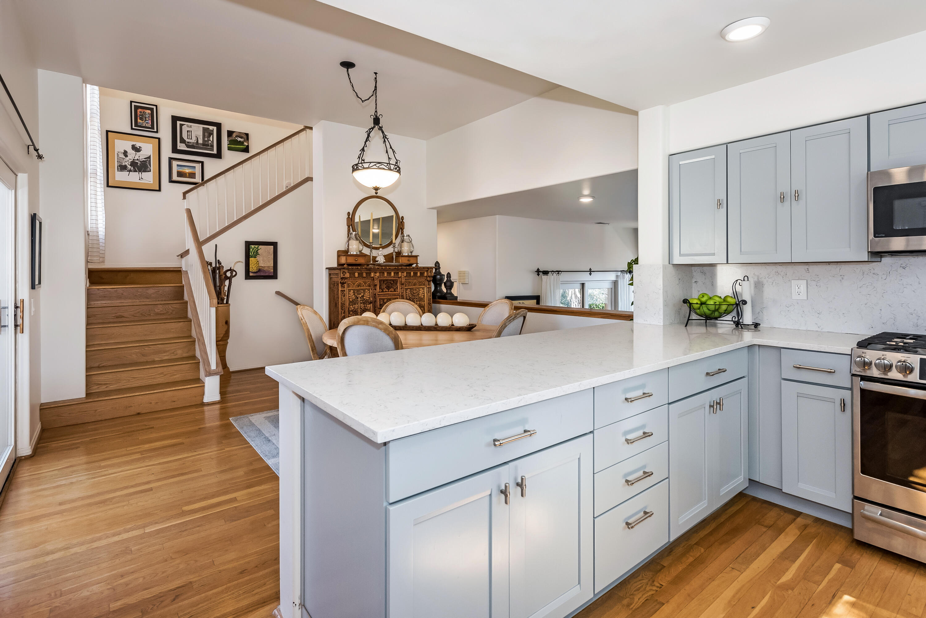 222 Meigs Road, Unit 16 Santa Barbara, CA 93109 - Photo 10 of 26 a kitchen with sink cabinets and wooden floor