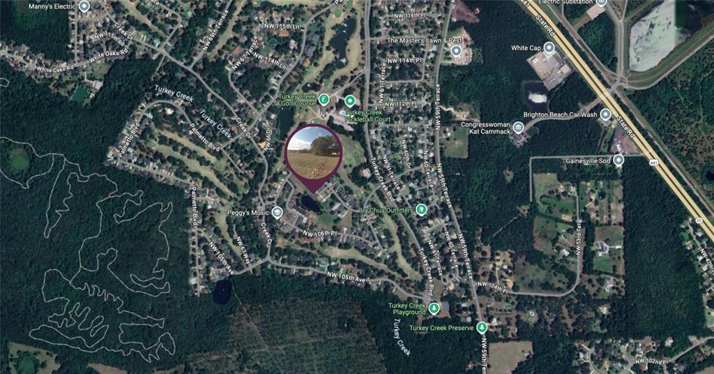 Northwest 109th Place Alachua, FL 32615 - Photo 2 of 6 a view of a back yard