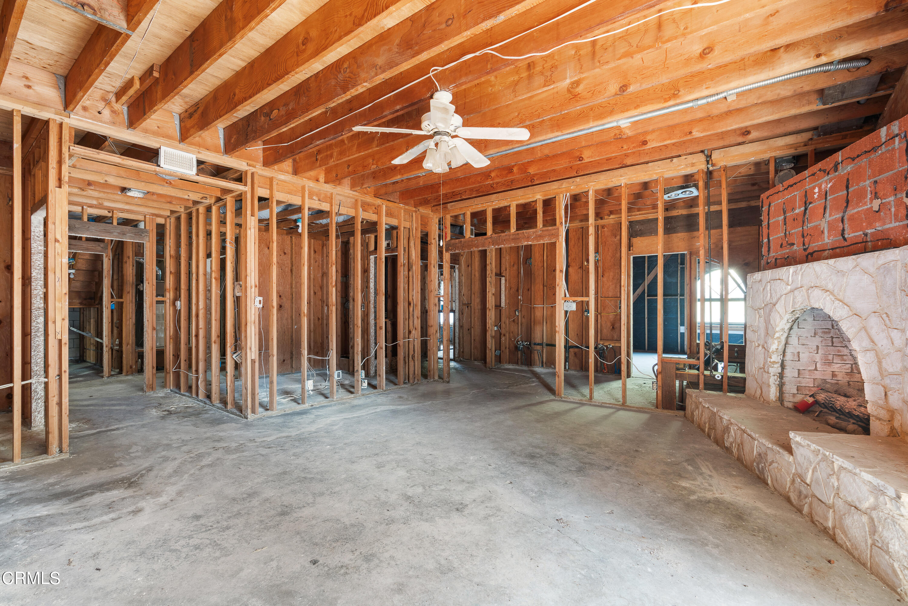 853 Chapea Road Pasadena, CA 91107 - Photo 14 of 32 a view of a room with furniture and a ceiling fan