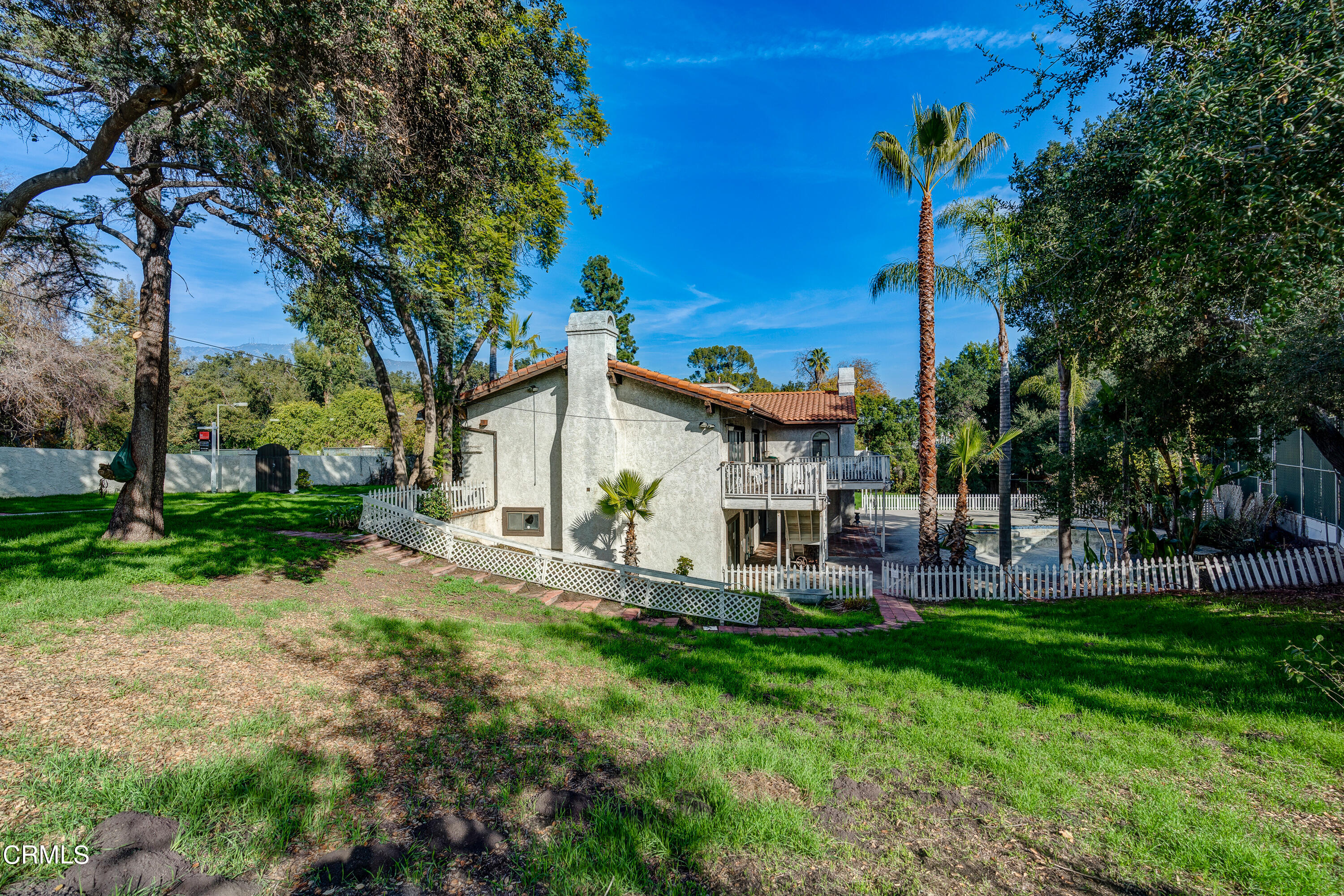 853 Chapea Road Pasadena, CA 91107 - Photo 23 of 32 a view of a house with a backyard and a patio