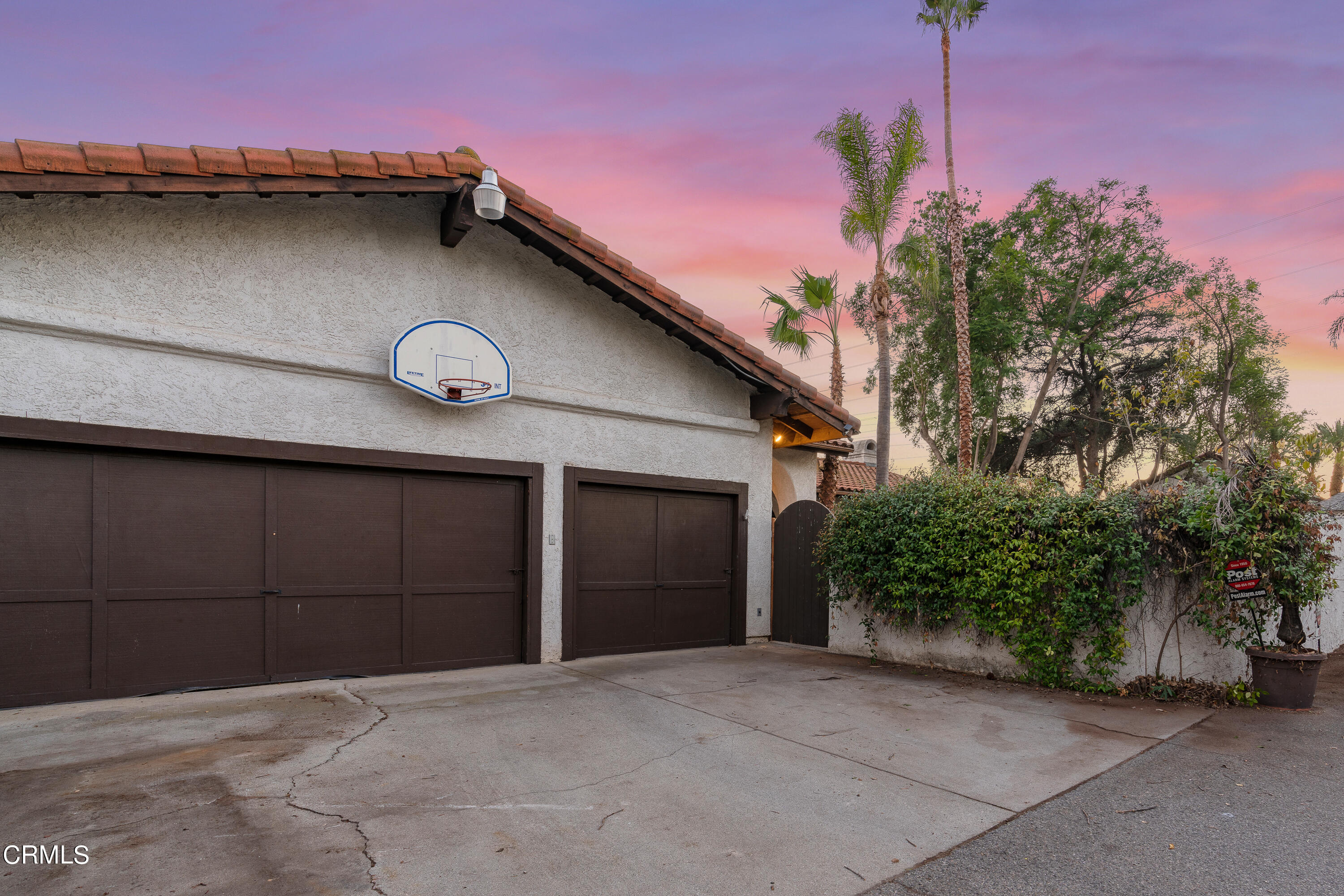853 Chapea Road Pasadena, CA 91107 - Photo 31 of 32 a front view of a house with a yard and garage