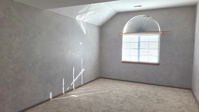 a view of a bathroom with mirror