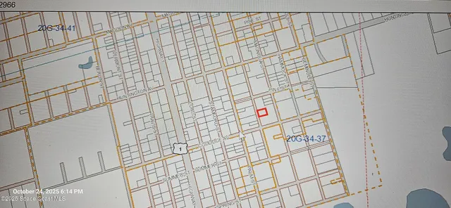 a bathroom with a shower curtain and a shower curtain