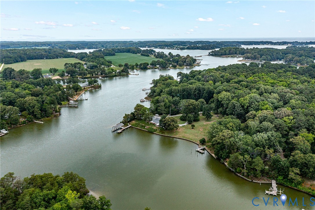 142 Bridge Lane Reedville, VA 22539 - Photo 22 of 56 an aerial view of residential houses with outdoor space and lake view