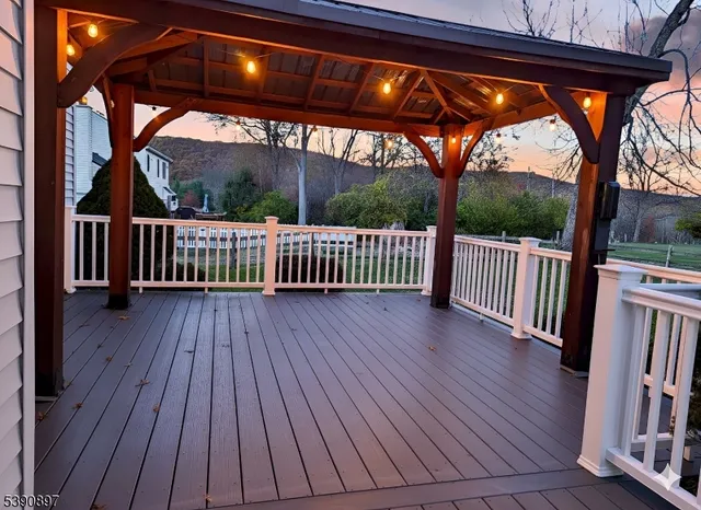 a view of porch with deck and wooden floor