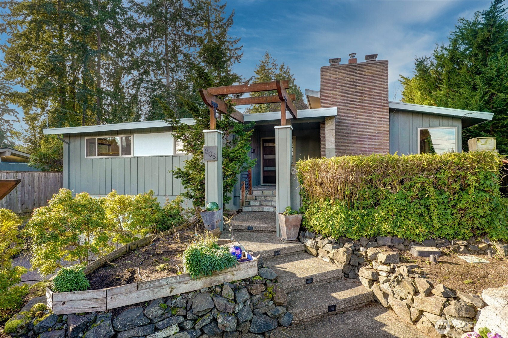 front view of a house with a yard