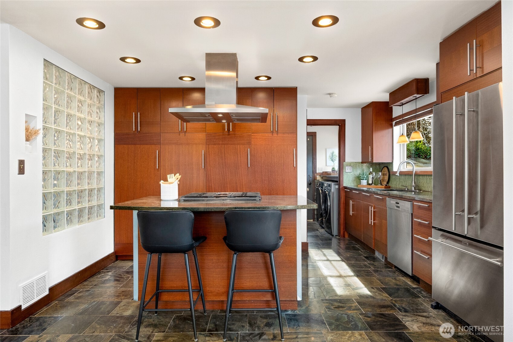 808 Alameda Avenue Fircrest, WA 98466 - Photo 11 of 39 a kitchen with stainless steel appliances kitchen island granite countertop a refrigerator and a stove