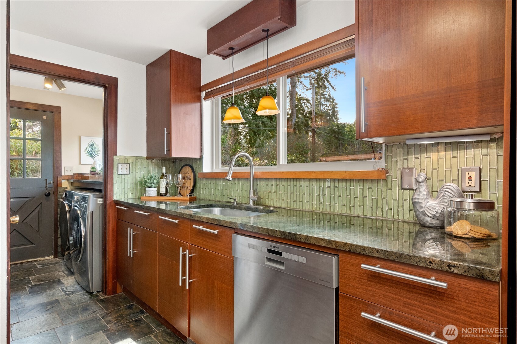 808 Alameda Avenue Fircrest, WA 98466 - Photo 12 of 39 a kitchen with stainless steel appliances granite countertop a sink a stove and a refrigerator