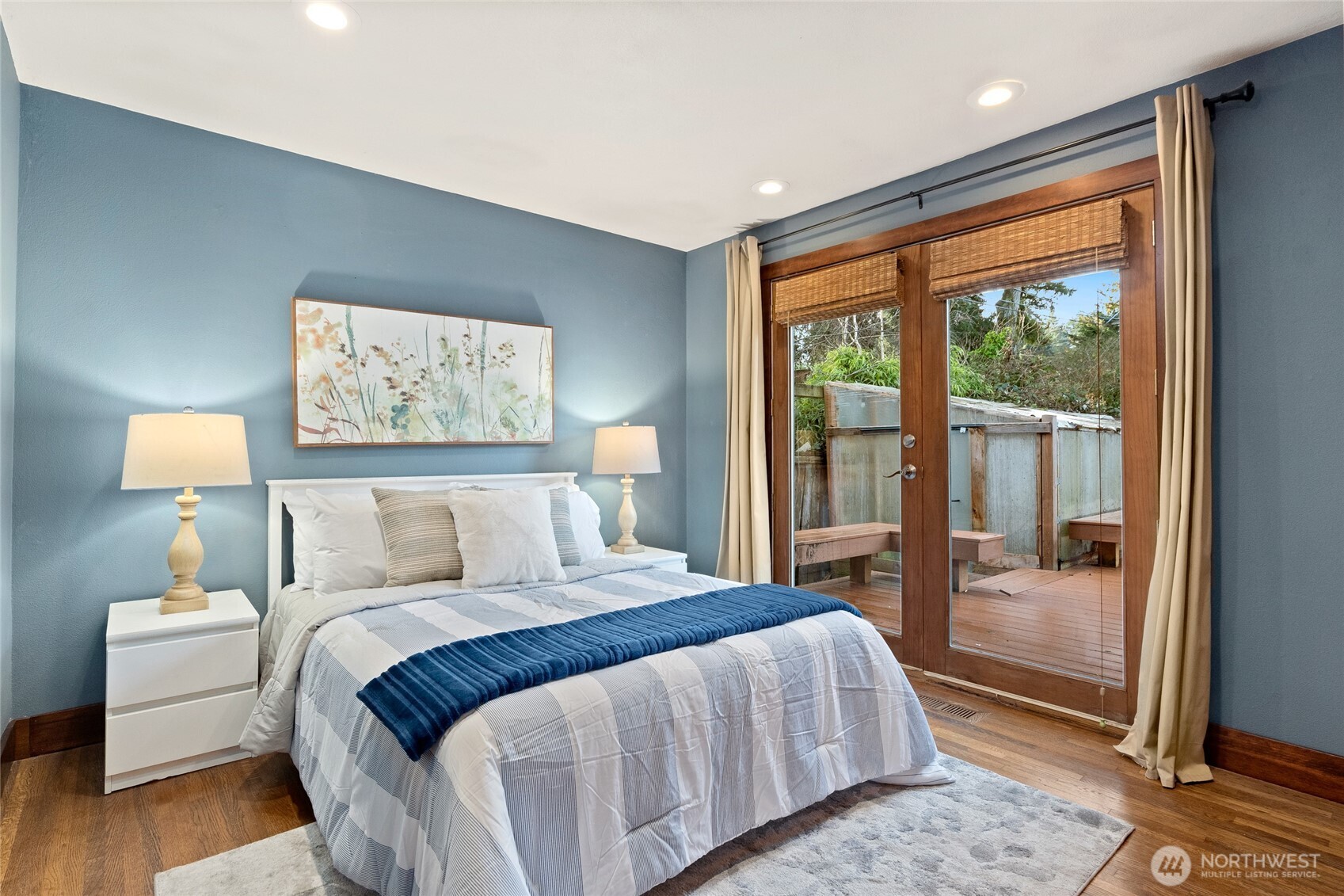 808 Alameda Avenue Fircrest, WA 98466 - Photo 17 of 39 a bedroom with a large bed and a window