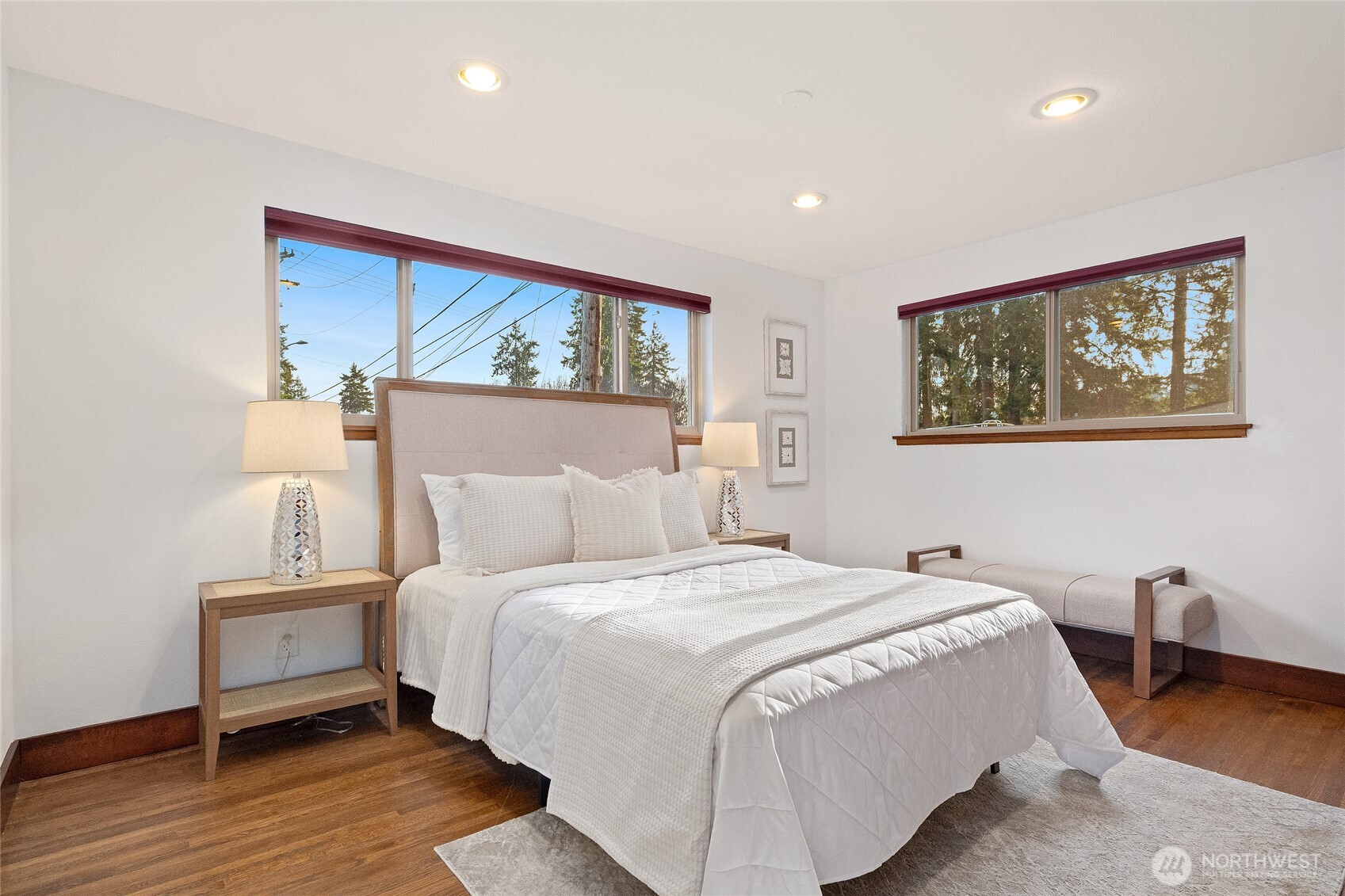808 Alameda Avenue Fircrest, WA 98466 - Photo 19 of 39 a bedroom with a bed and wooden floor