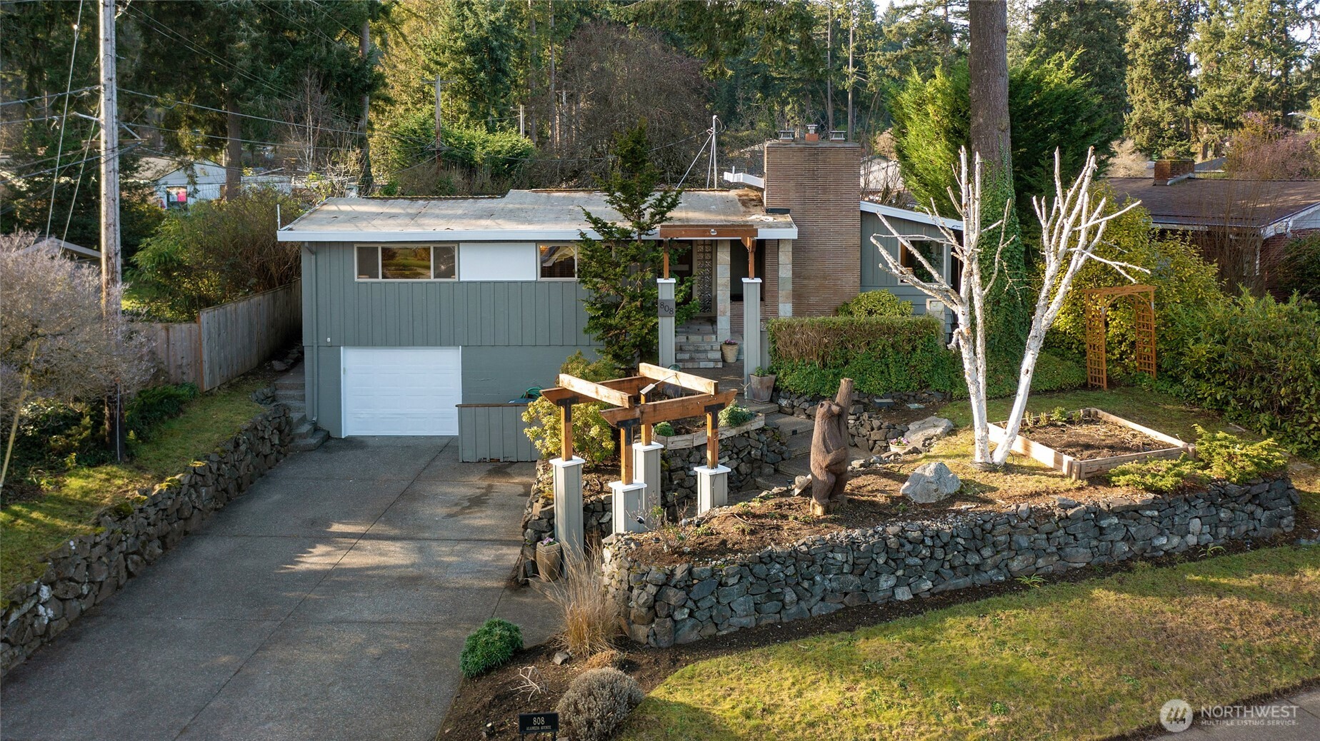 808 Alameda Avenue Fircrest, WA 98466 - Photo 2 of 39 a front view of a house with swimming pool