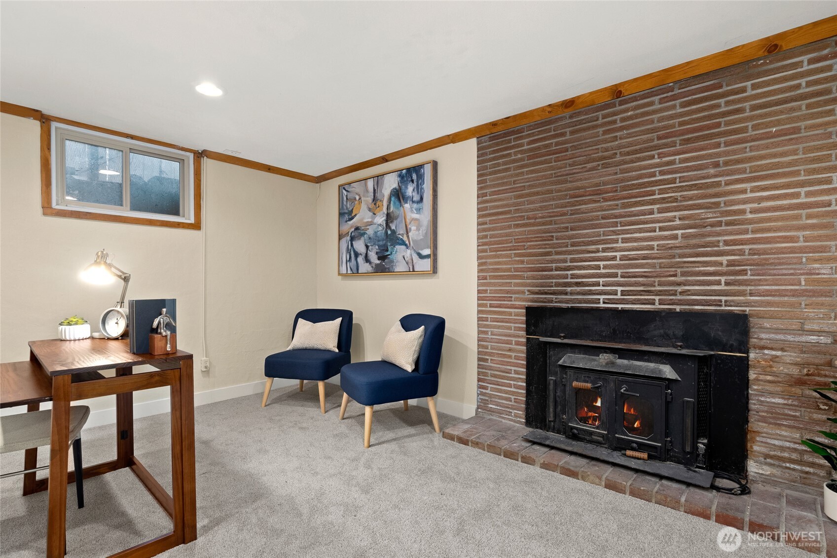 808 Alameda Avenue Fircrest, WA 98466 - Photo 27 of 39 a living room with furniture and a fireplace