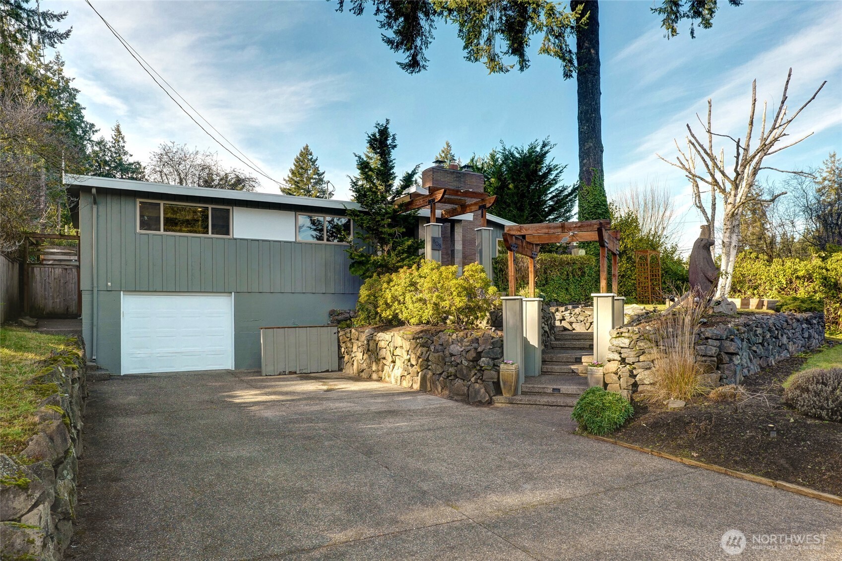 808 Alameda Avenue Fircrest, WA 98466 - Photo 3 of 39 a front view of a house with garden