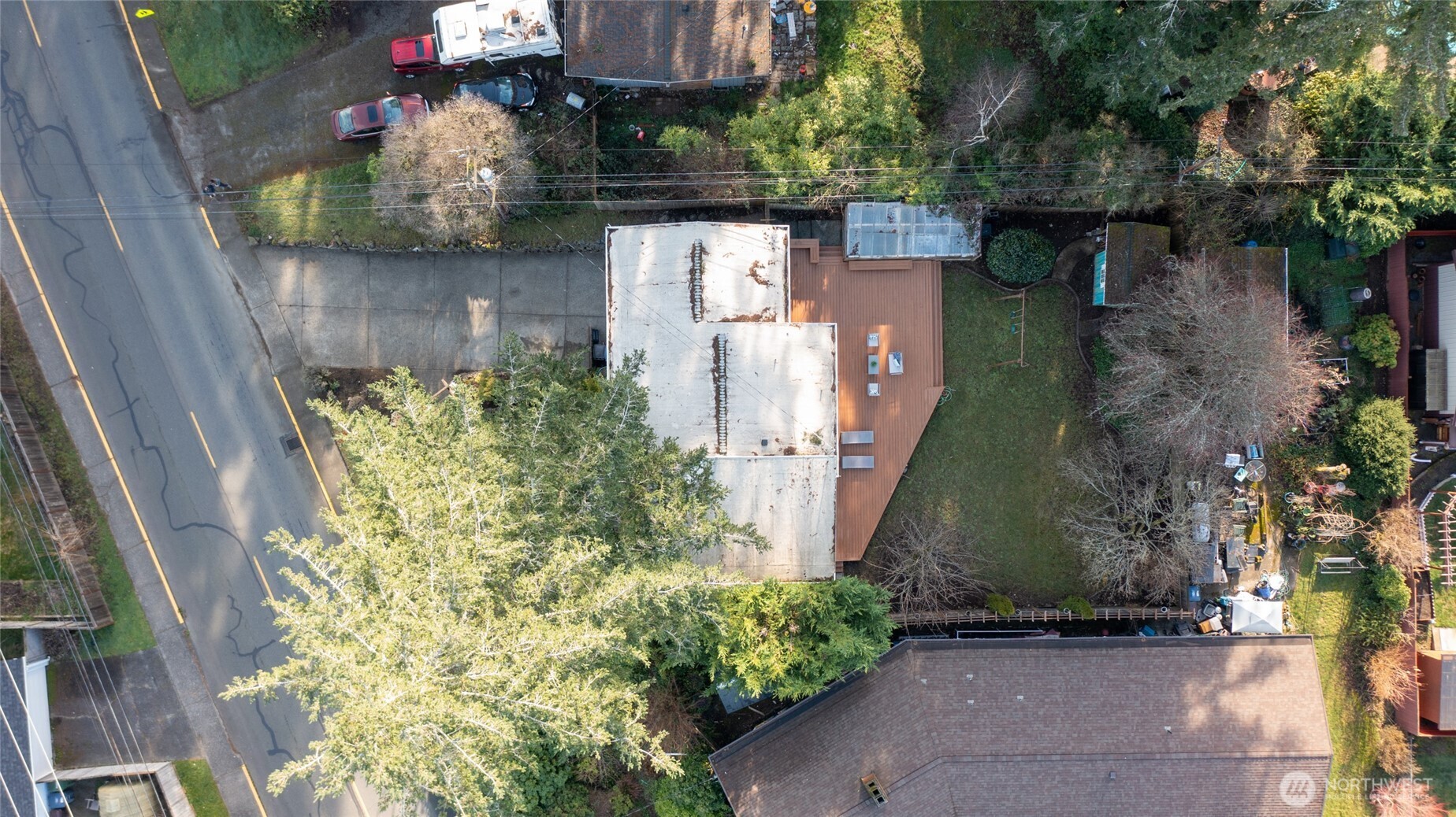 808 Alameda Avenue Fircrest, WA 98466 - Photo 32 of 39 a backyard of a house with lots of green space and plants