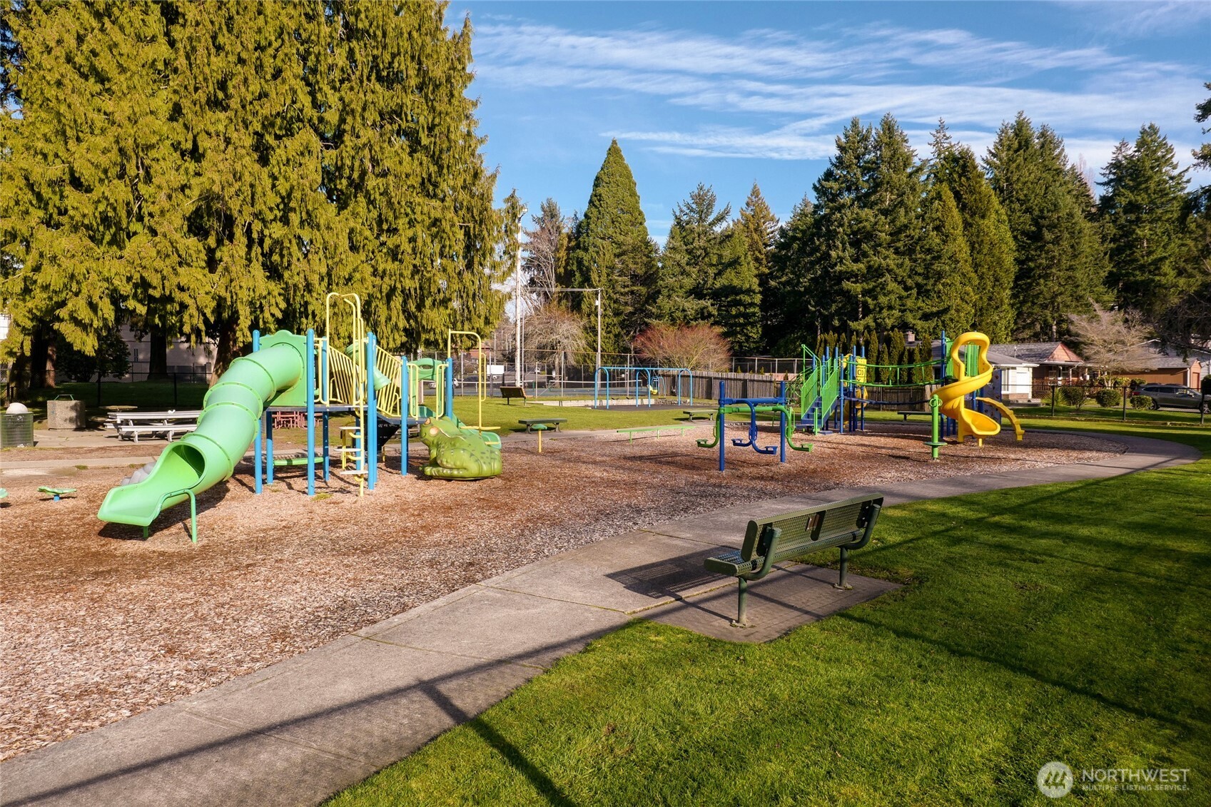 808 Alameda Avenue Fircrest, WA 98466 - Photo 37 of 39 a view of a park with swings and slides