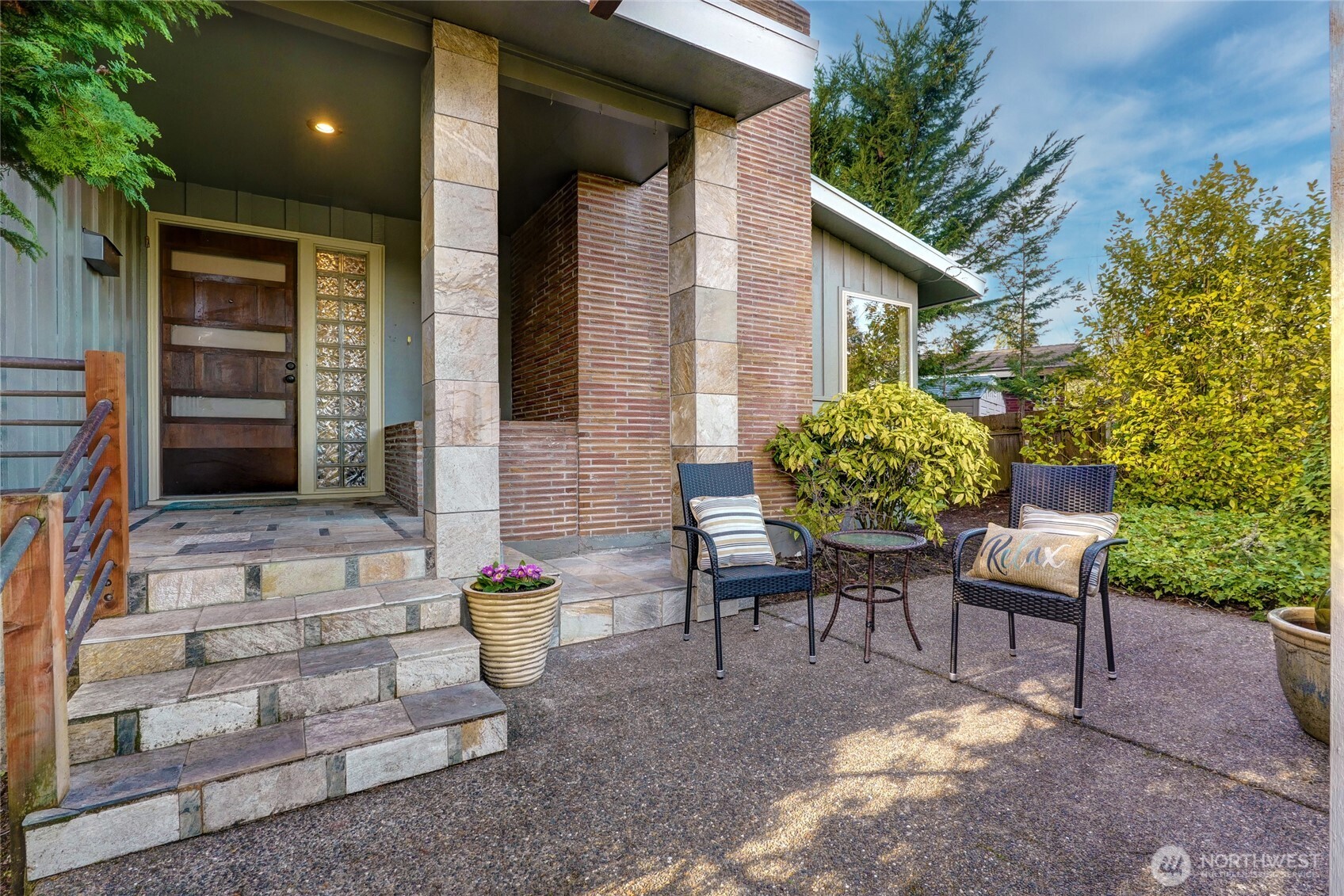 808 Alameda Avenue Fircrest, WA 98466 - Photo 4 of 39 a view of a chair and table in back yard of the house