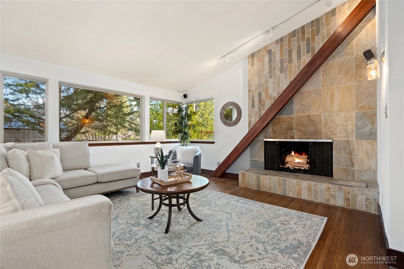 808 Alameda Avenue Fircrest, WA 98466 - Photo 5 of 39 a living room with furniture and a fireplace