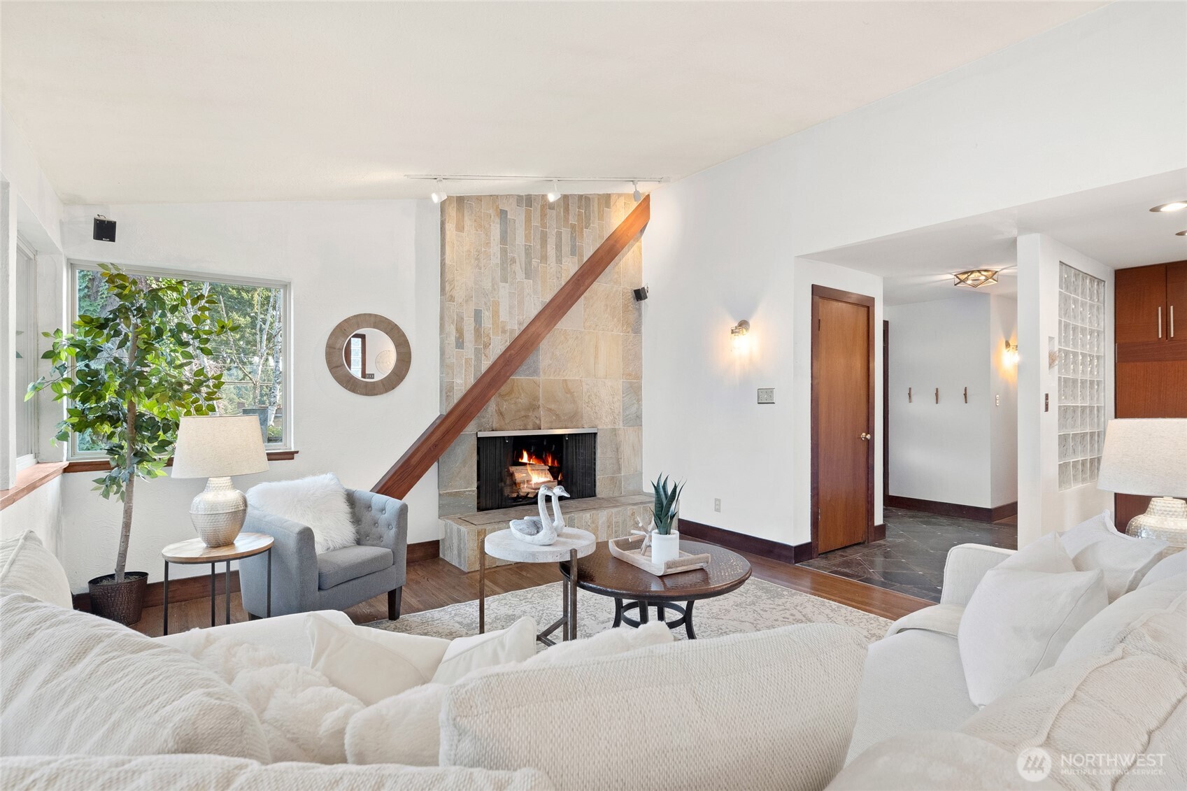 808 Alameda Avenue Fircrest, WA 98466 - Photo 6 of 39 a living room with furniture and a clock