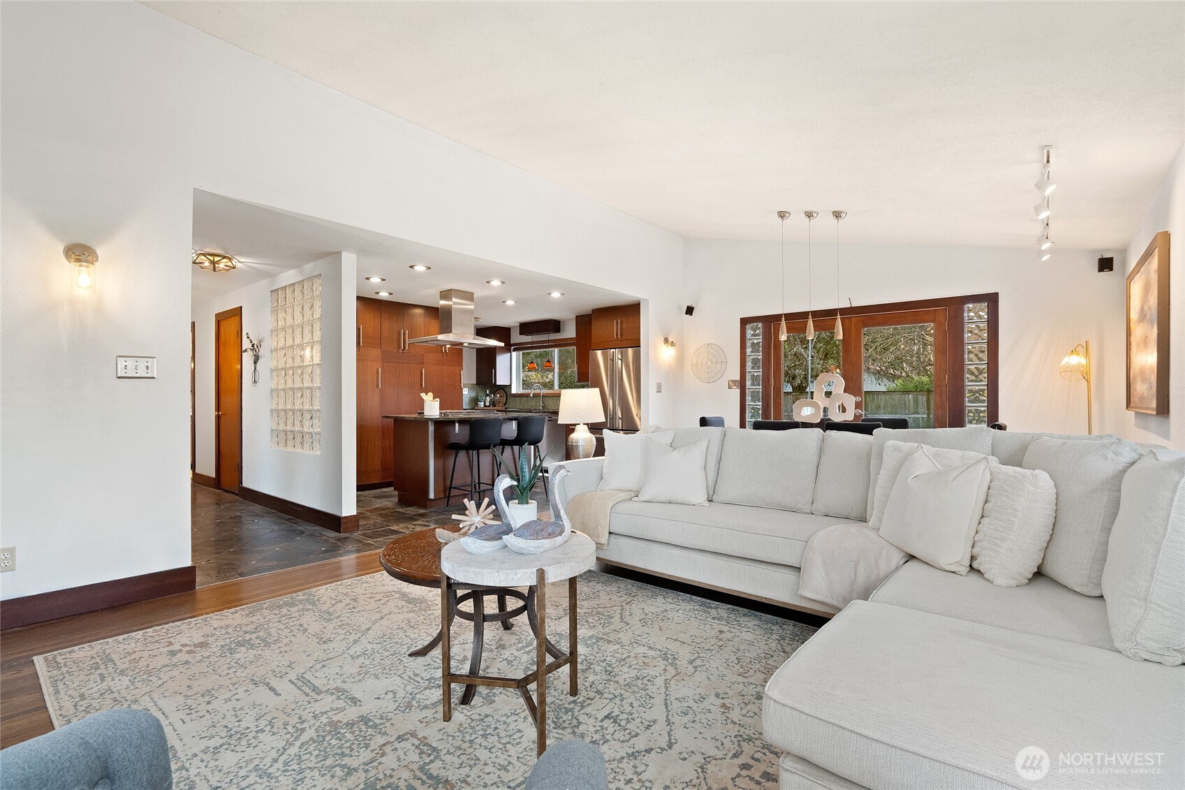 808 Alameda Avenue Fircrest, WA 98466 - Photo 8 of 39 a living room with furniture and wooden floor