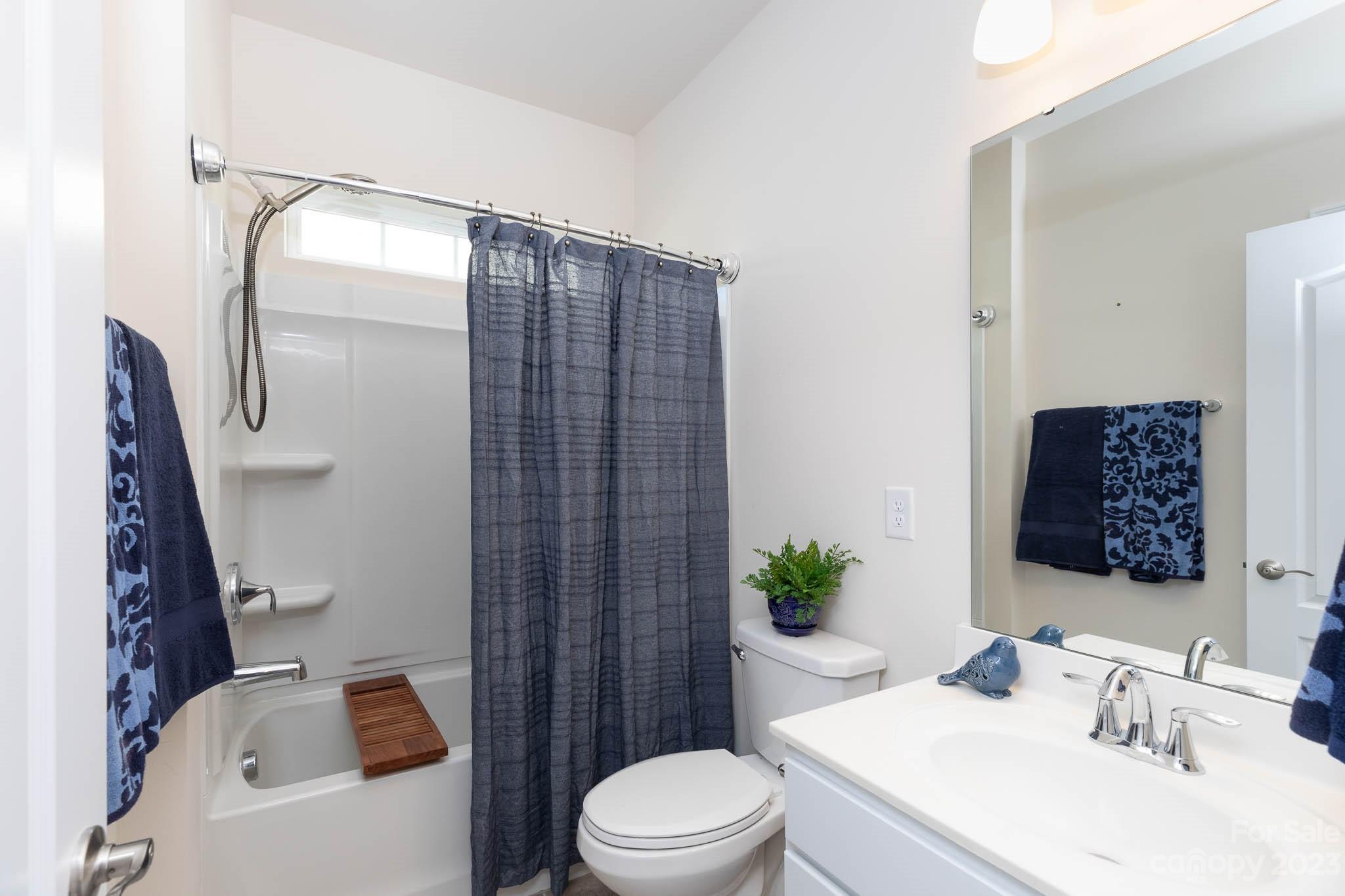 1609 Tranquility Boulevard Lancaster, SC 29720 - Photo 18 of 35 a bathroom with a sink toilet and shower