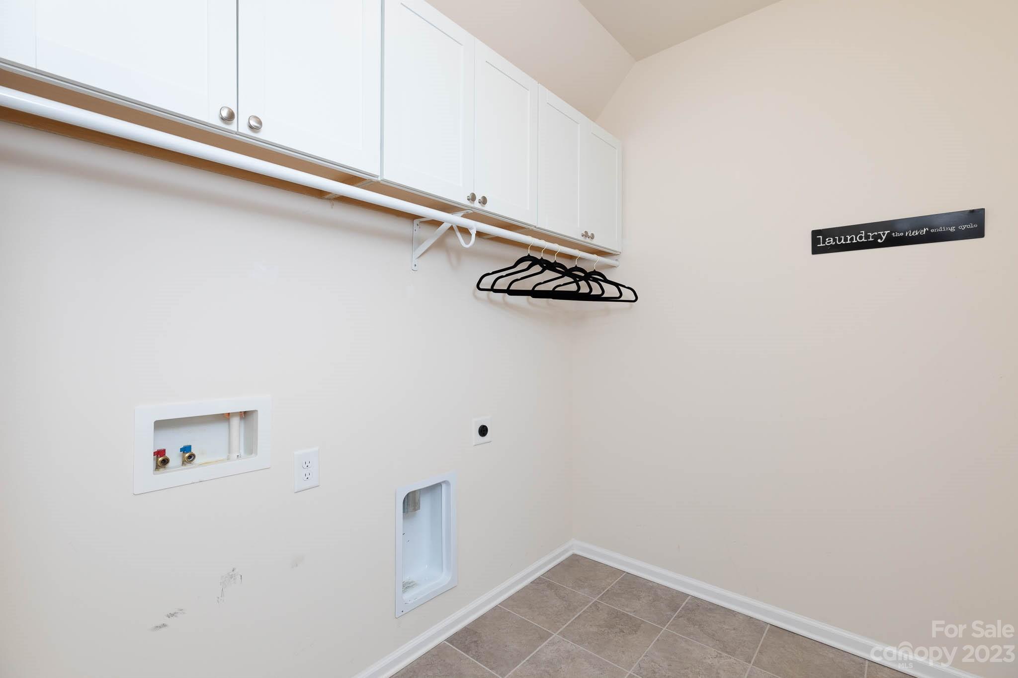1609 Tranquility Boulevard Lancaster, SC 29720 - Photo 19 of 35 a view of a storage and utility room with racks on the wall