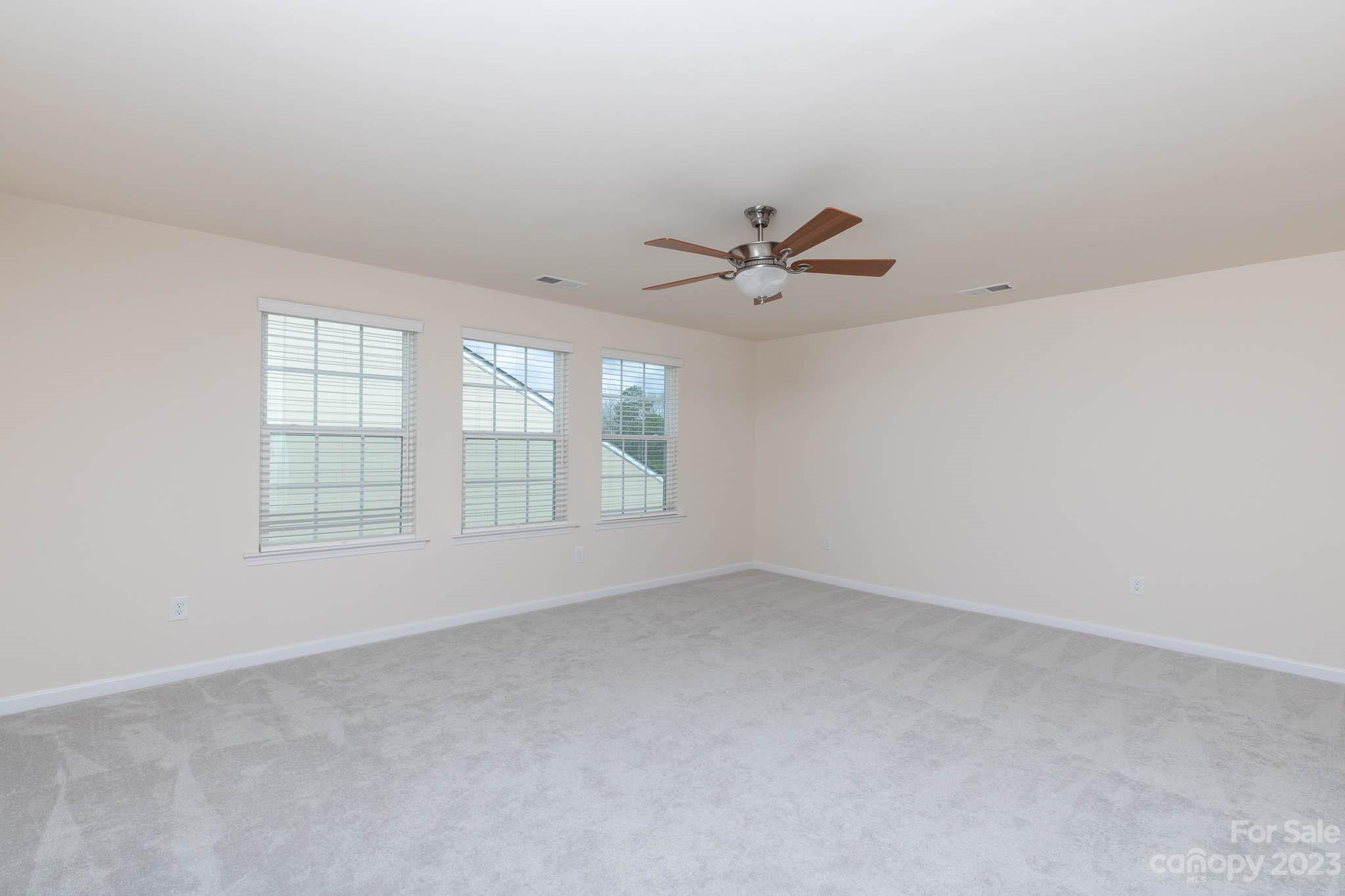 1609 Tranquility Boulevard Lancaster, SC 29720 - Photo 20 of 35 an empty room with a window