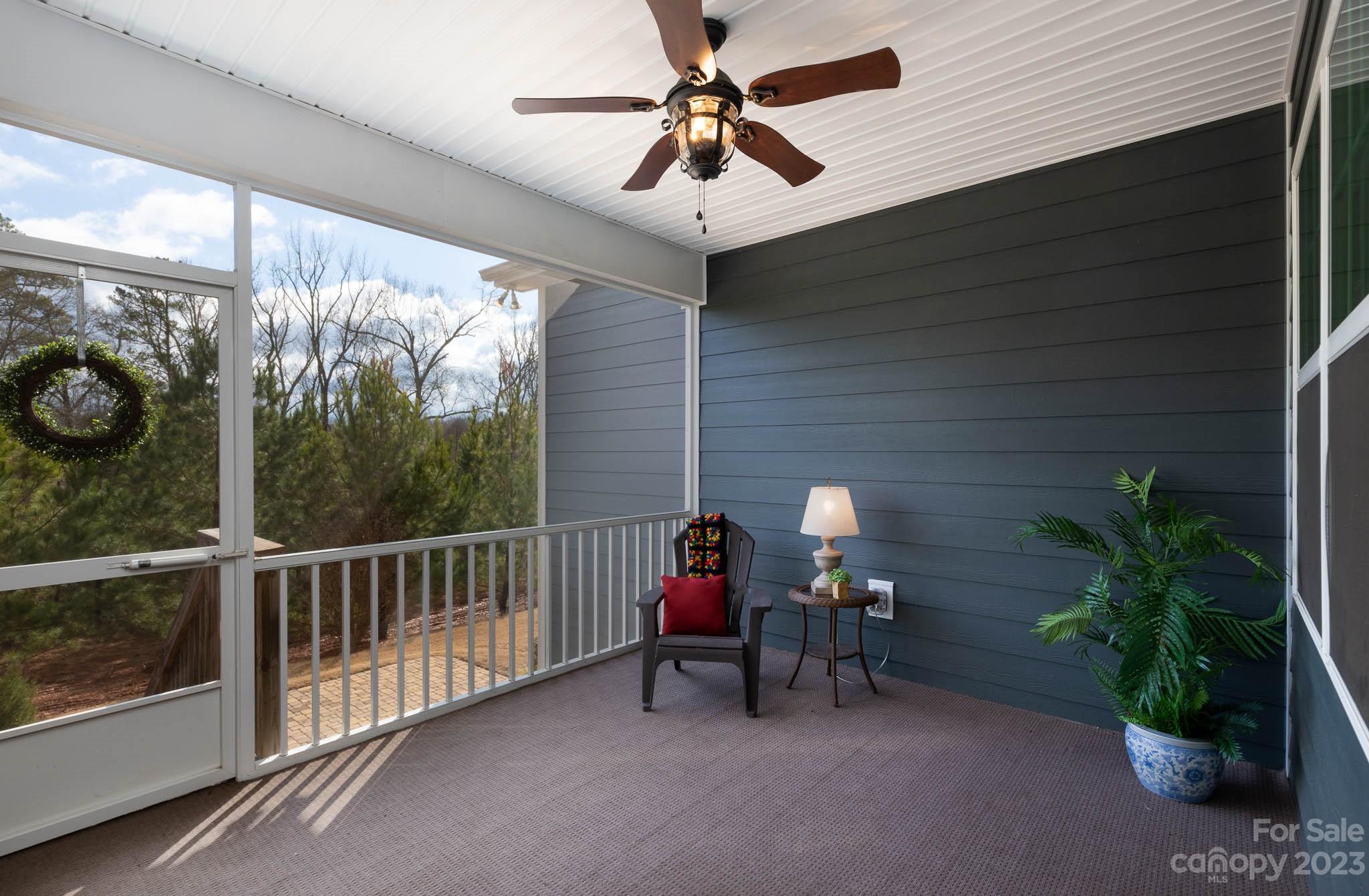 1609 Tranquility Boulevard Lancaster, SC 29720 - Photo 23 of 35 a man sitting on a bench in front of a building