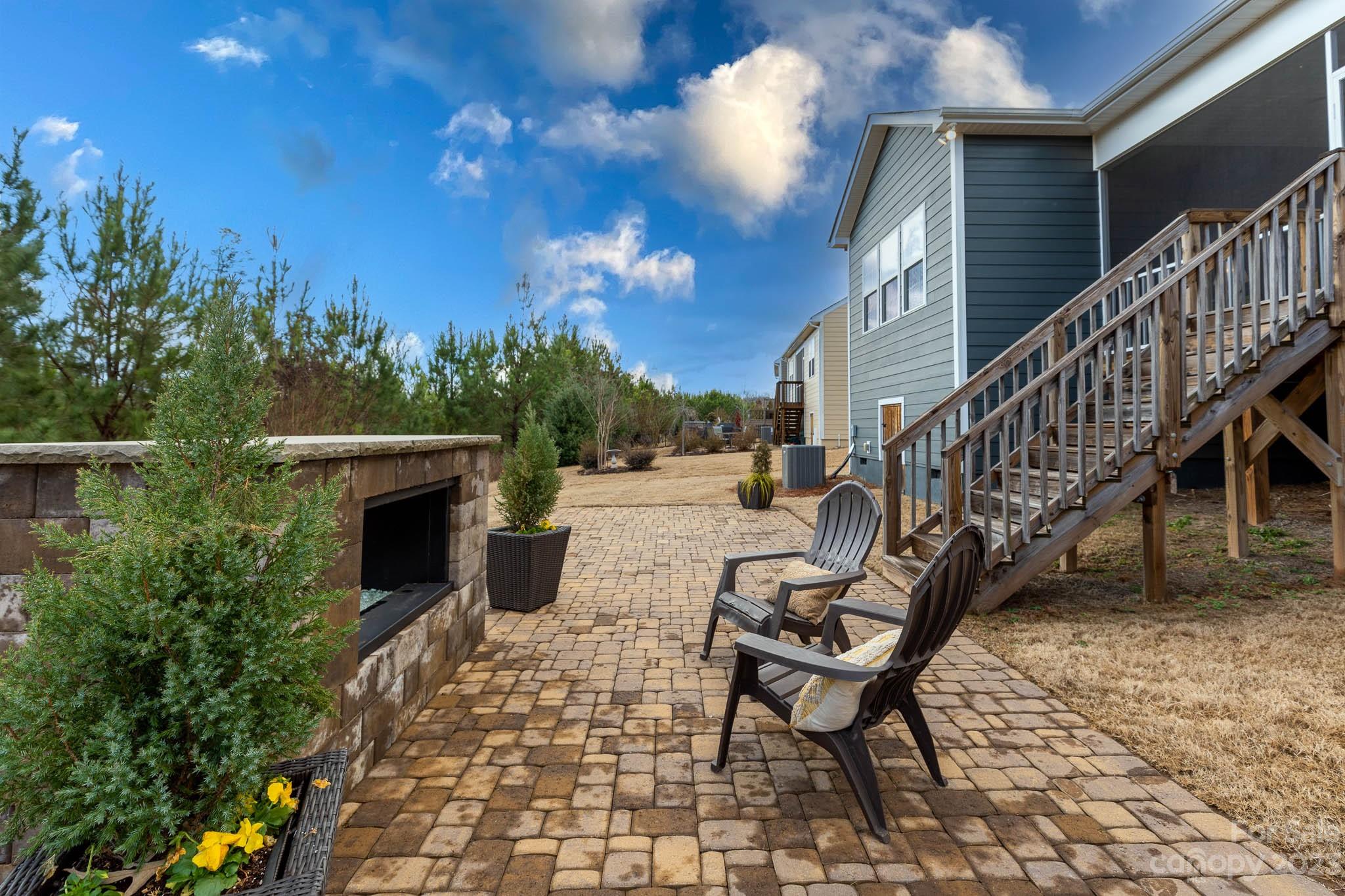 1609 Tranquility Boulevard Lancaster, SC 29720 - Photo 26 of 35 a view of a chairs and tables in the patio