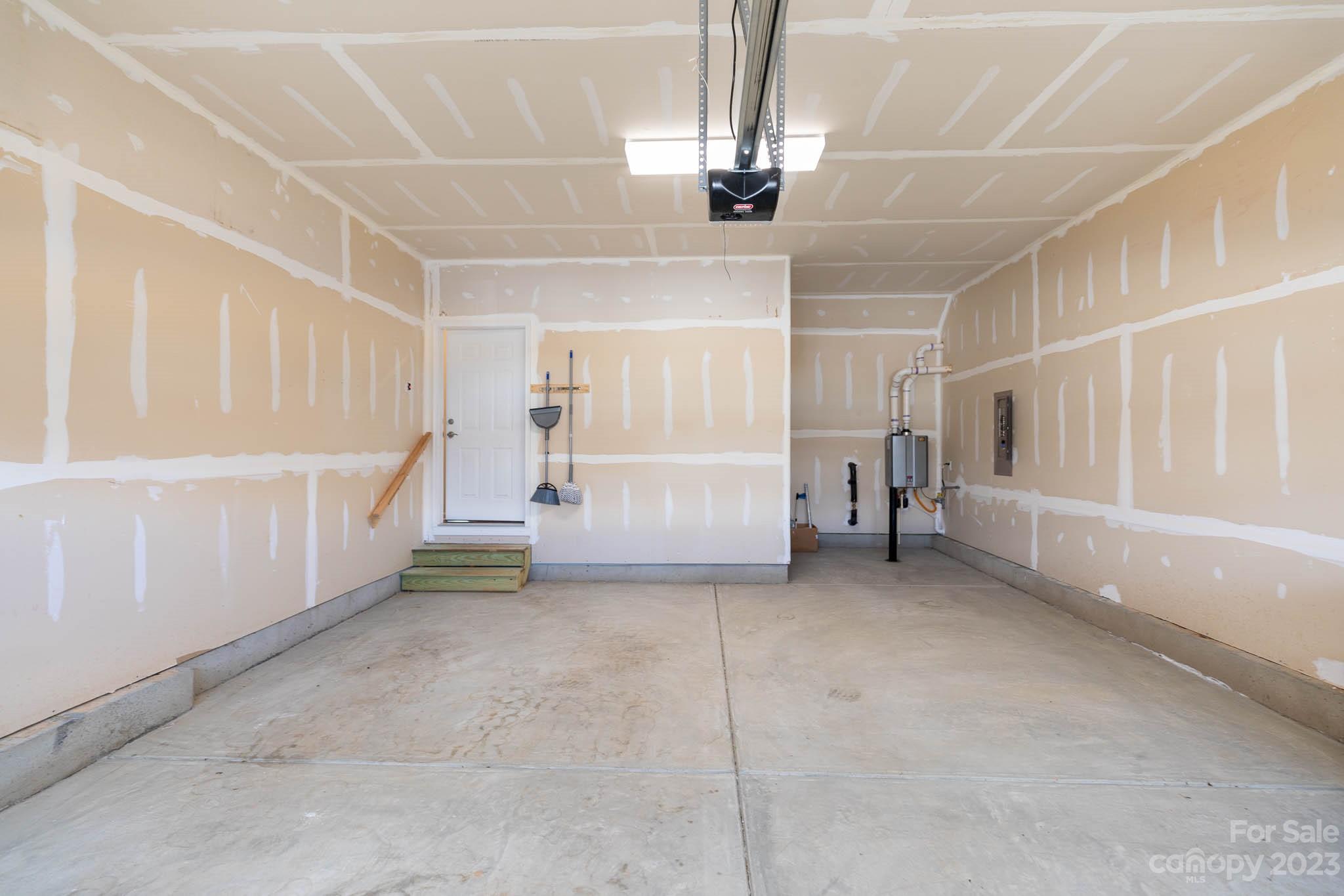 1609 Tranquility Boulevard Lancaster, SC 29720 - Photo 27 of 35 a view of a livingroom with furniture and staircase