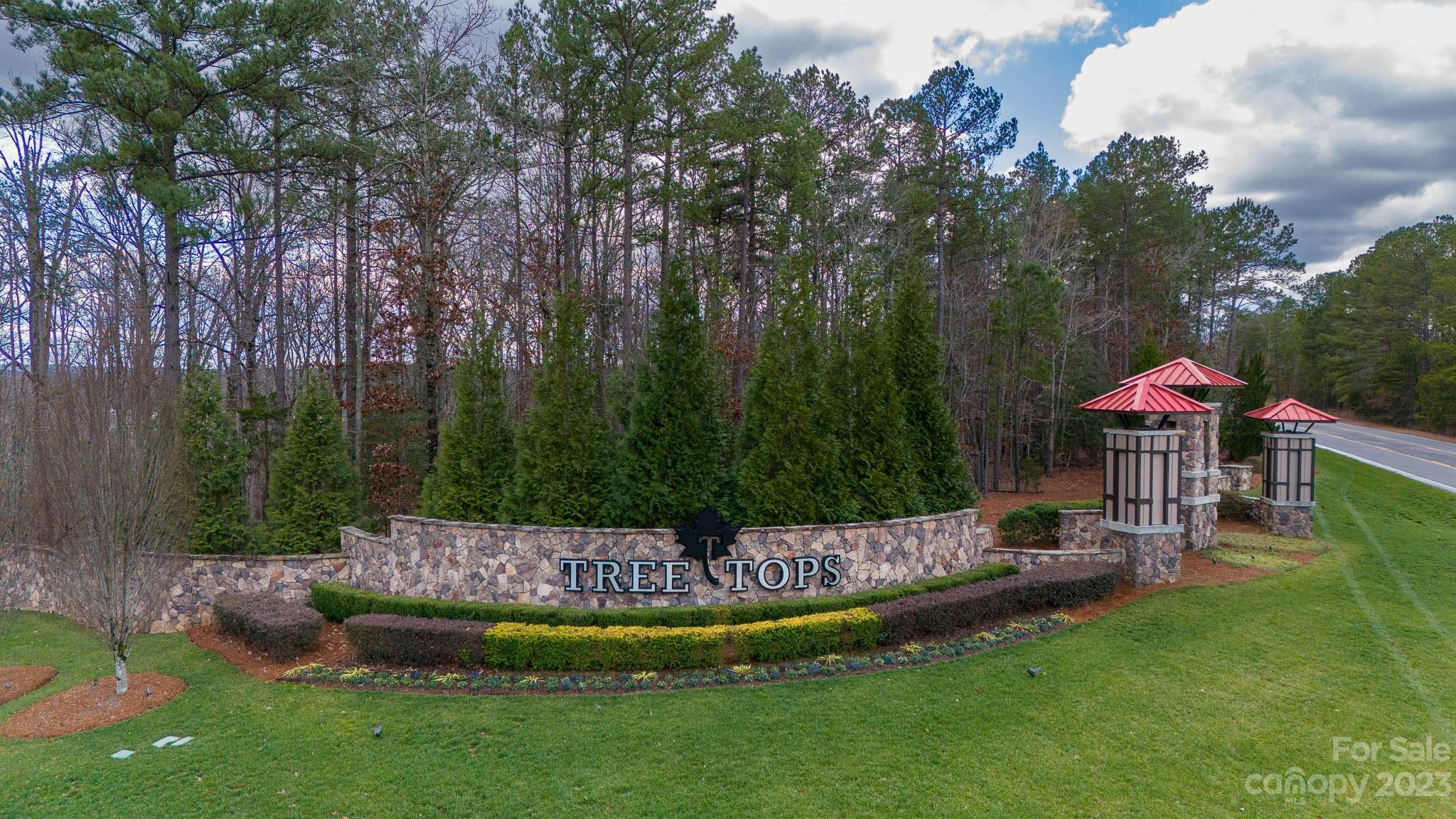 1609 Tranquility Boulevard Lancaster, SC 29720 - Photo 28 of 35 a view of a table and chairs in a garden