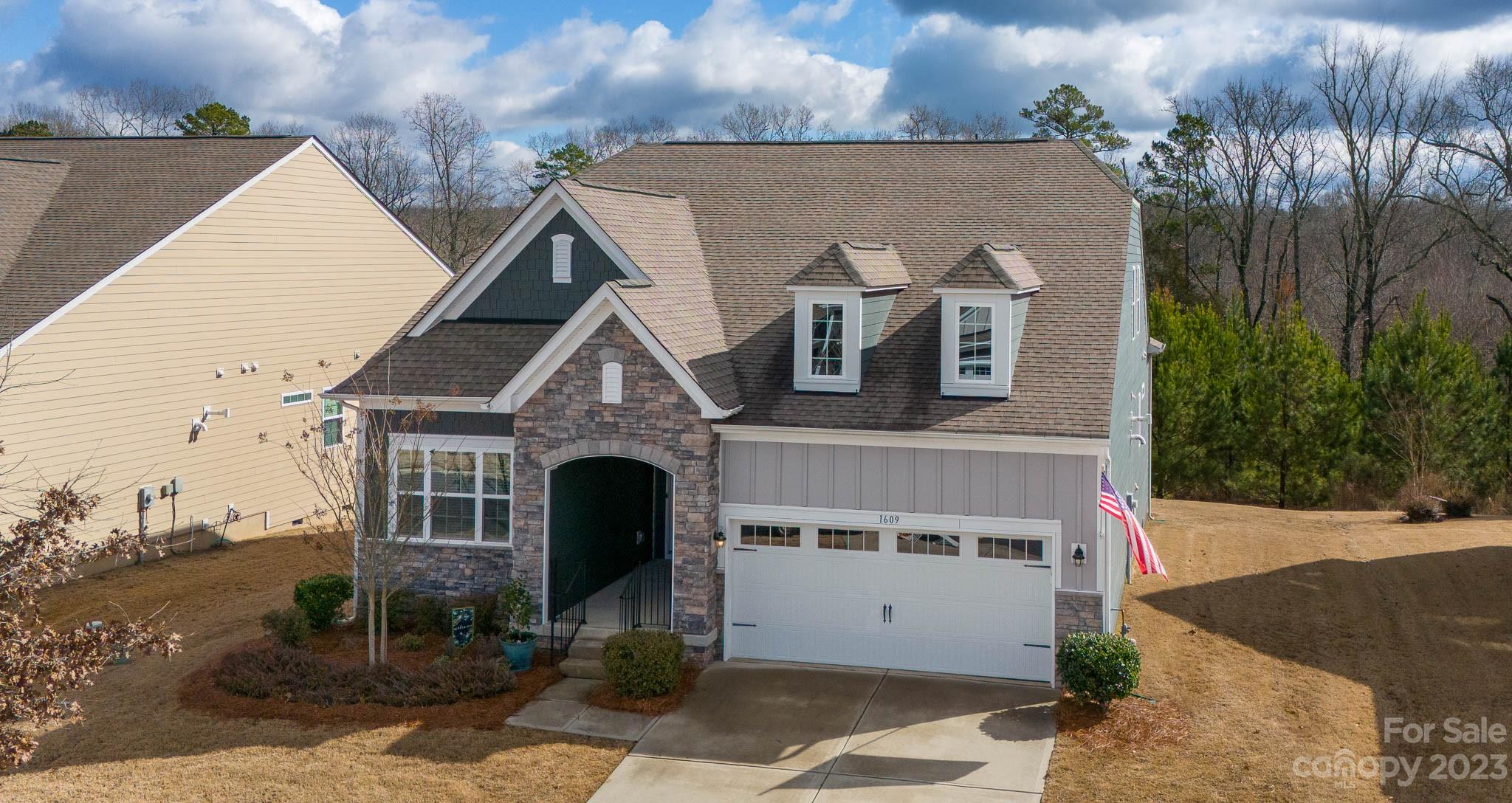 1609 Tranquility Boulevard Lancaster, SC 29720 - Photo 33 of 35 a aerial view of a house with a yard