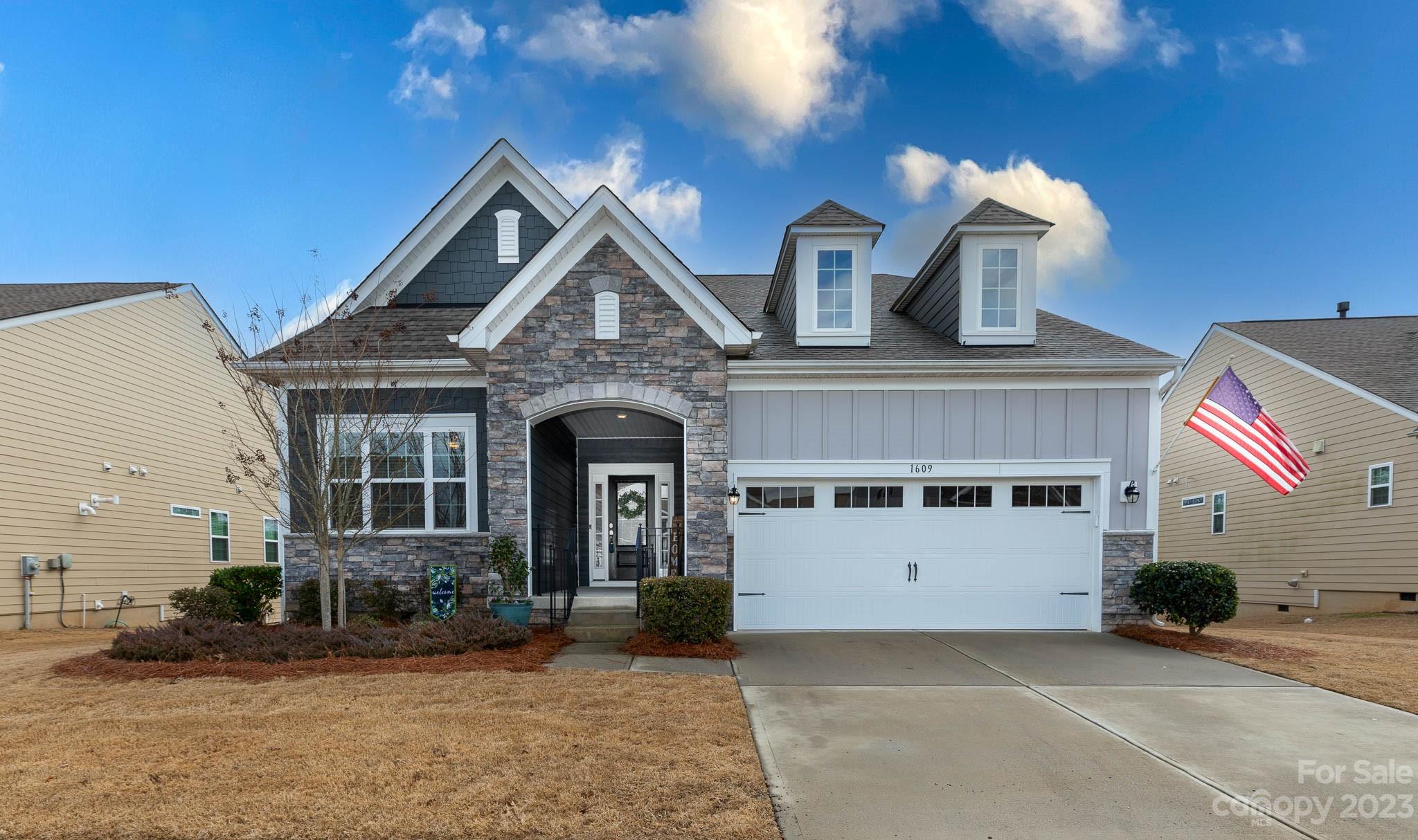 1609 Tranquility Boulevard Lancaster, SC 29720 - Photo 35 of 35 a front view of a house with a yard