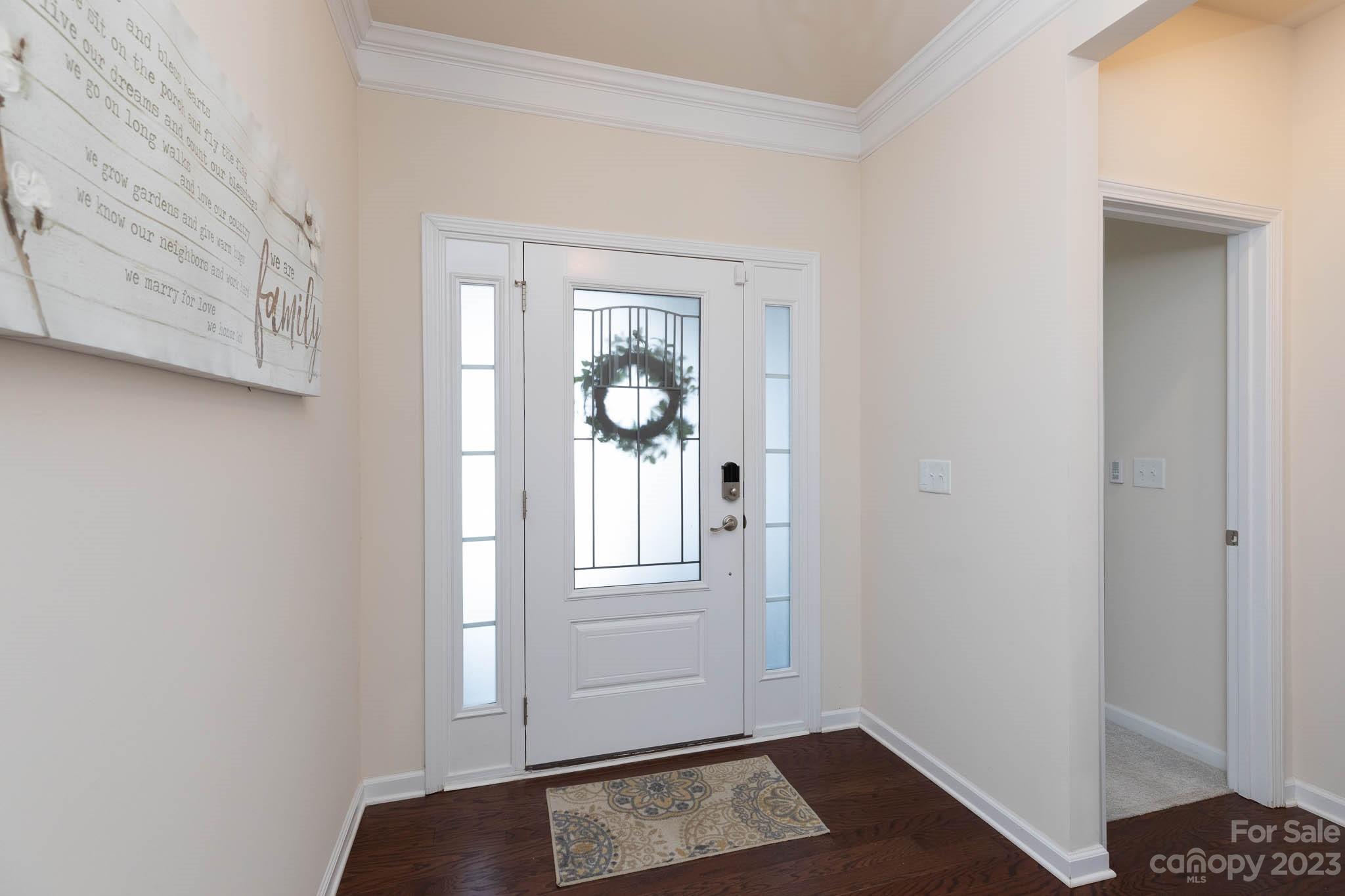 1609 Tranquility Boulevard Lancaster, SC 29720 - Photo 4 of 35 a view of an entryway with wooden floor