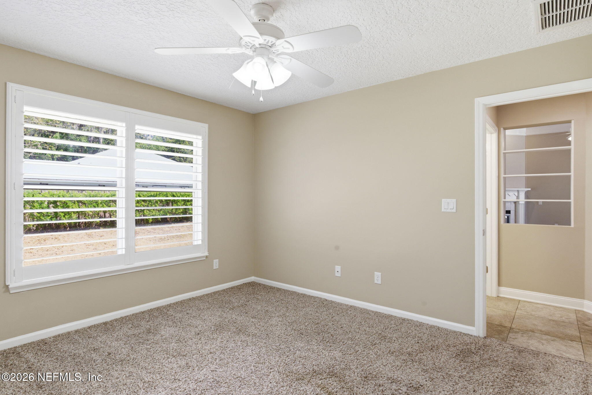 1600 Spring Water Court Fleming Island, FL 32003 - Photo 40 of 85 a view of an empty room with a window