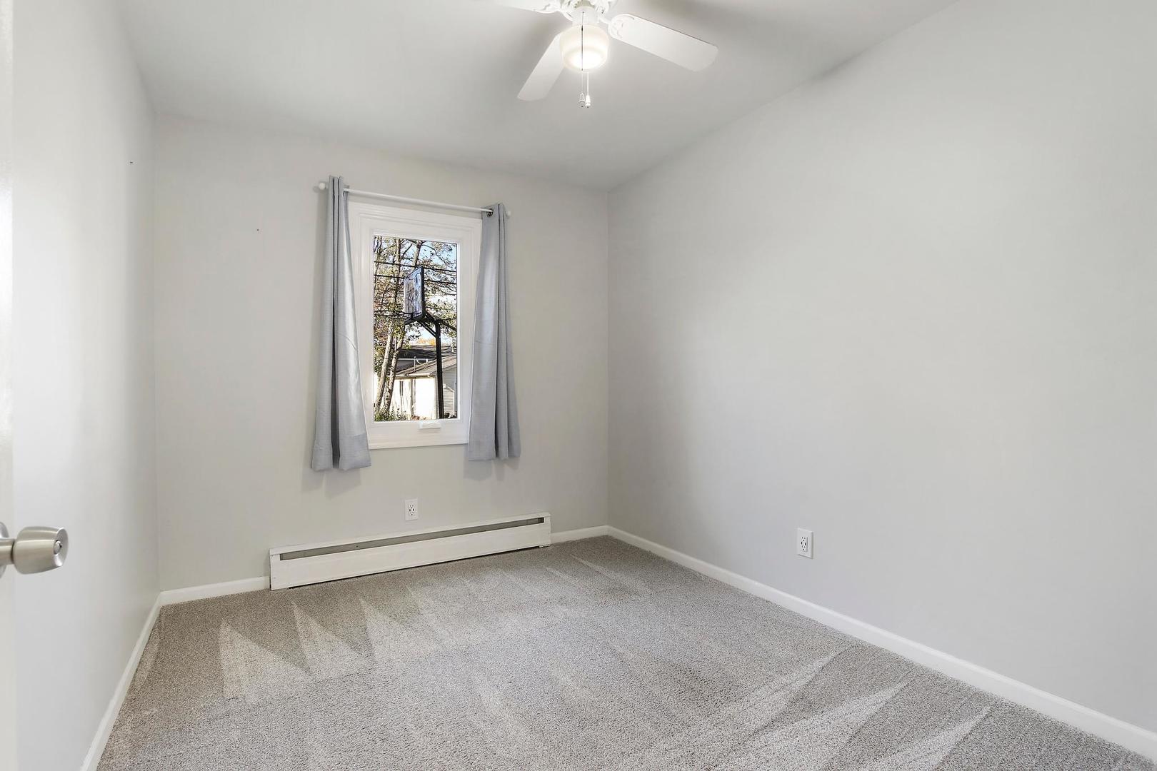 35835 North Benjamin Avenue Ingleside, IL 60041 - Photo 7 of 17 an empty room with a window