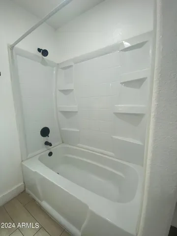 a bathroom with a bathtub