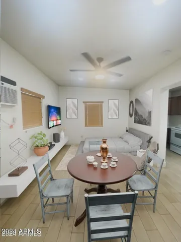 a view of a dining room with furniture